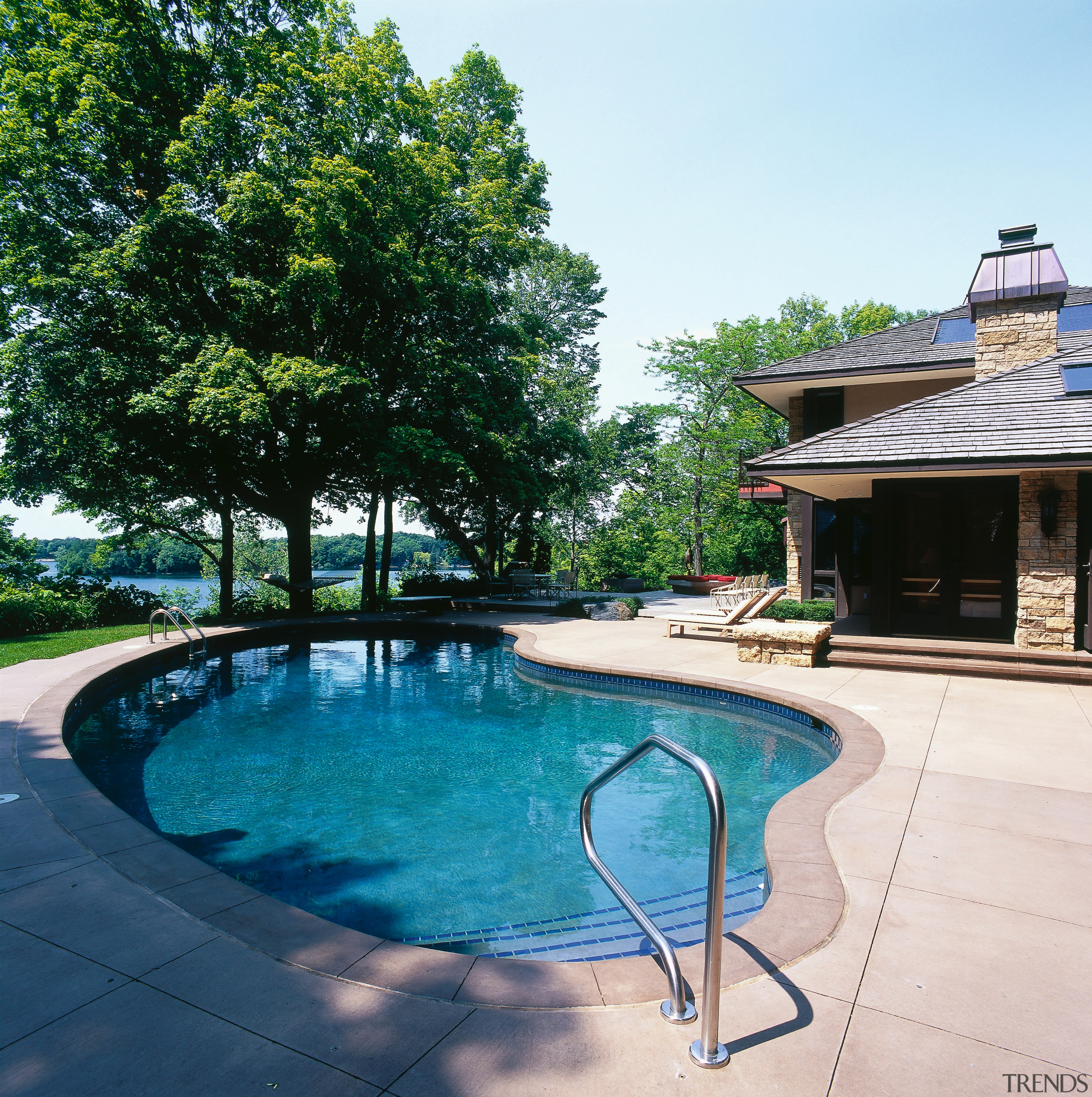 View of this pools - View of this backyard, estate, home, house, leisure, outdoor structure, property, real estate, resort, swimming pool, tree, villa, water, white