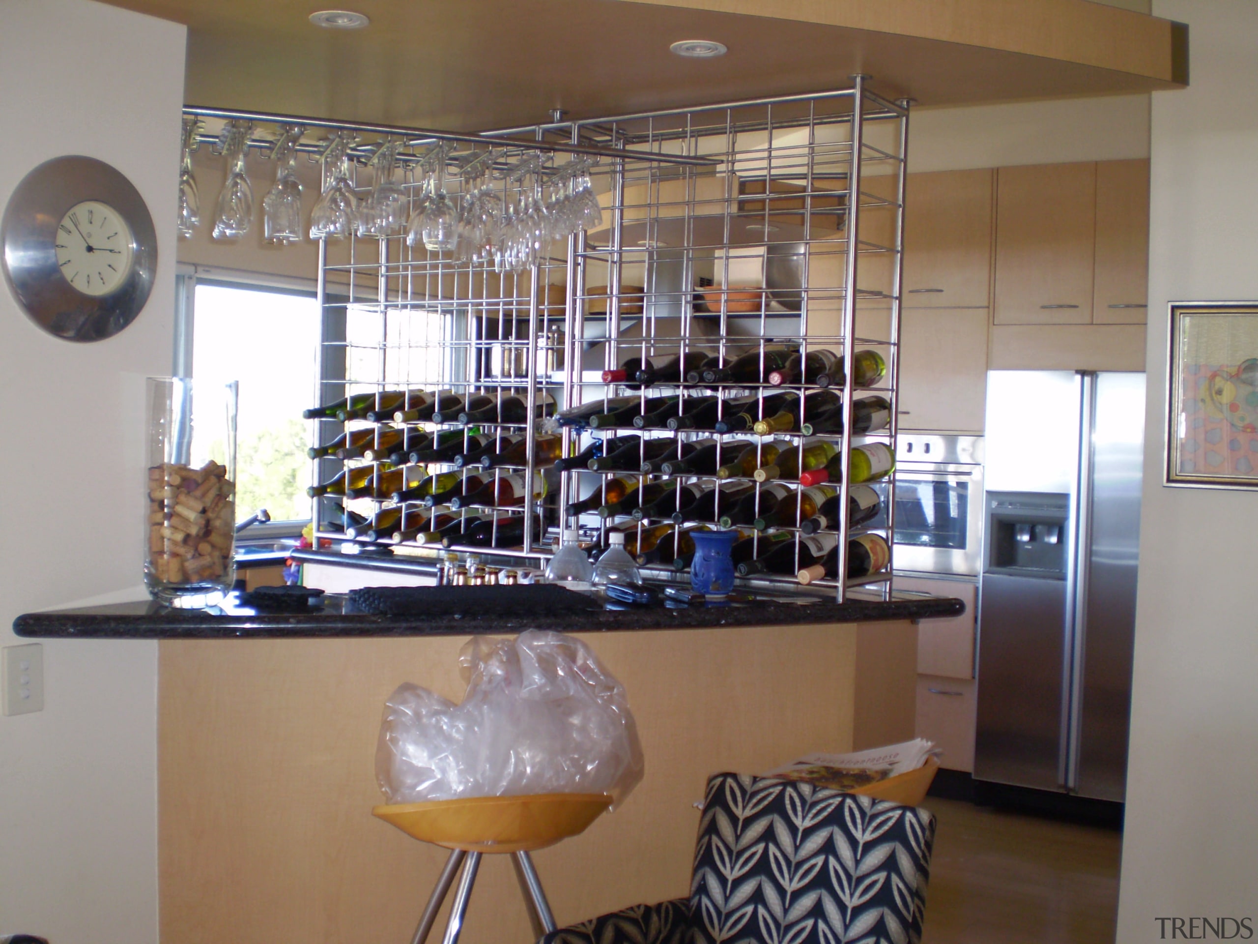 While effective for parties, this large wine rack furniture, glass, interior design, table, gray, brown