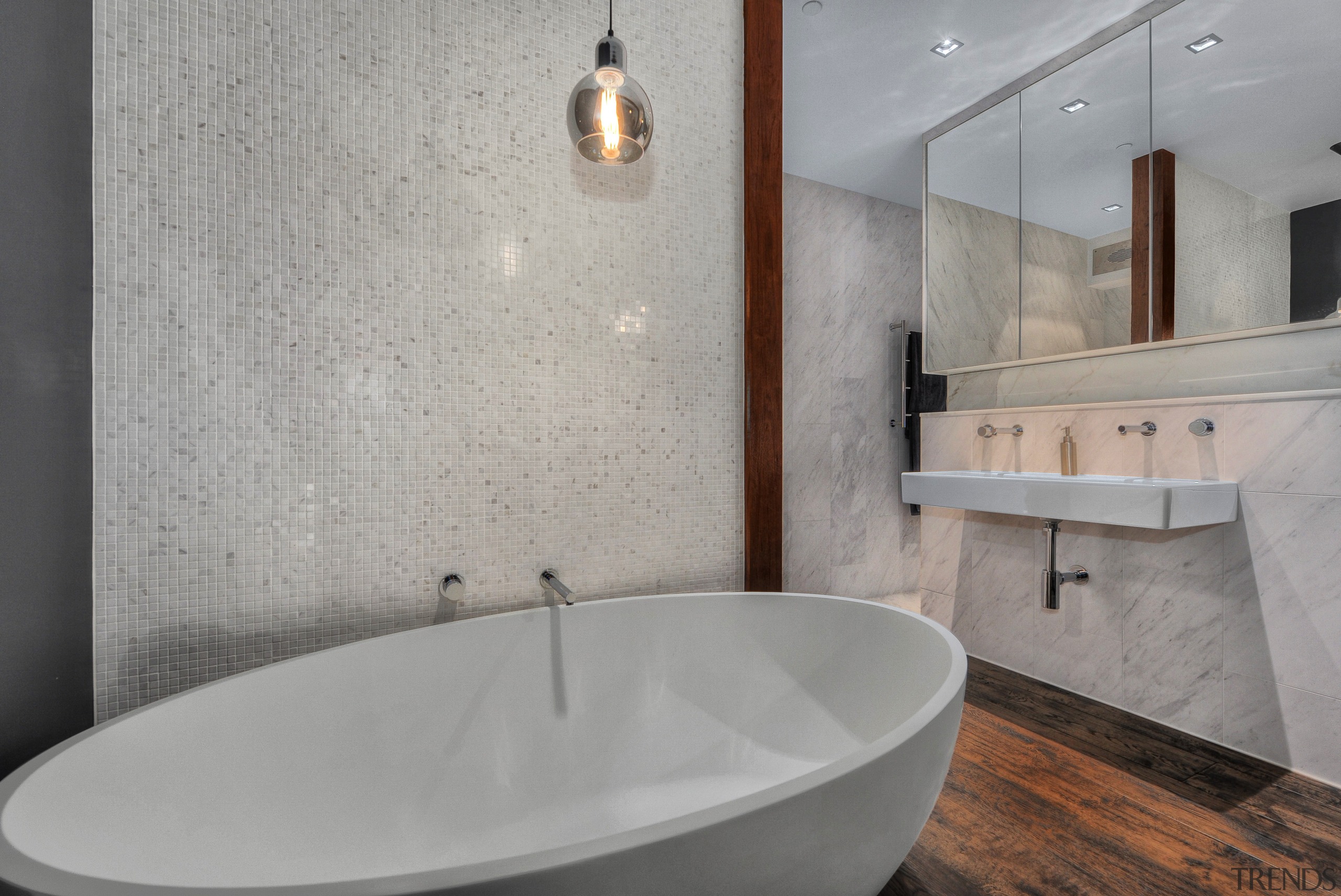 Large mirrors above the bathroom vanity conceal storage bathroom, bathroom sink, bidet, ceramic, floor, interior design, plumbing fixture, product design, room, sink, tap, tile, gray