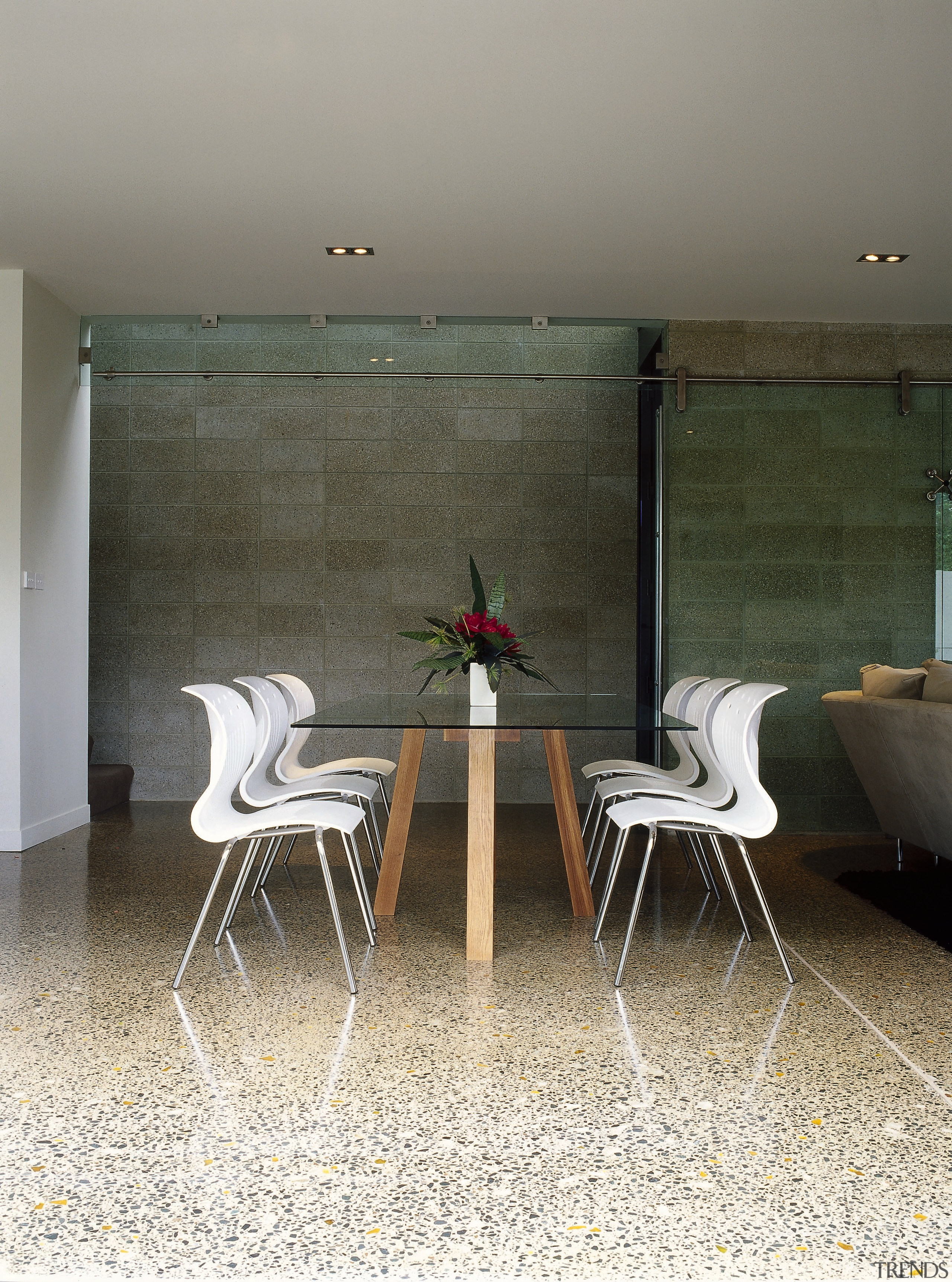 Show home featuring polished concrete exposed-aggregate flooring incorporating architecture, chair, floor, flooring, furniture, home, house, interior design, table, wall, wood, gray, white