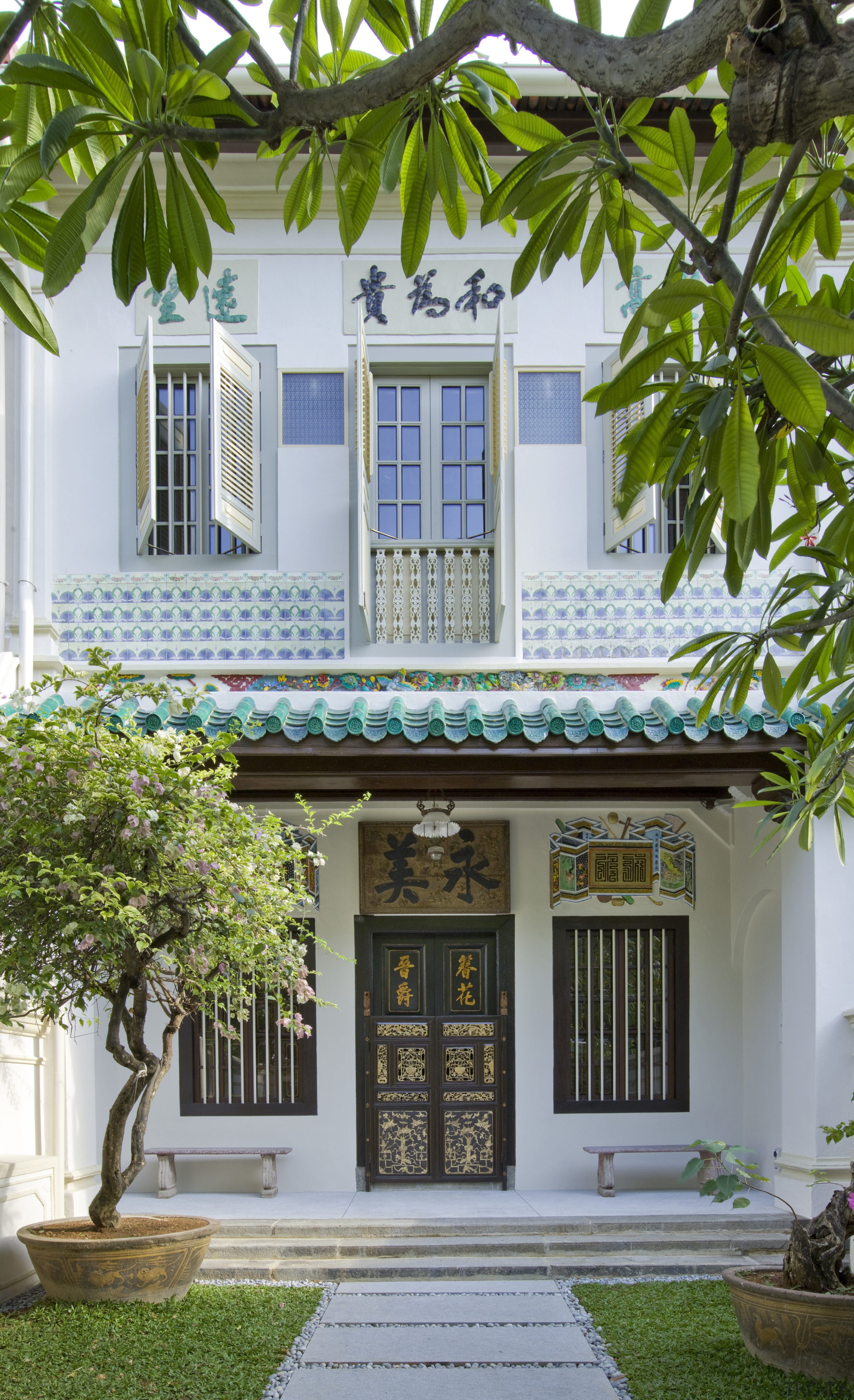 Exterior shot of entranceway - Exterior shot of architecture, arecales, building, courtyard, estate, facade, home, house, mansion, property, real estate, window, gray, brown