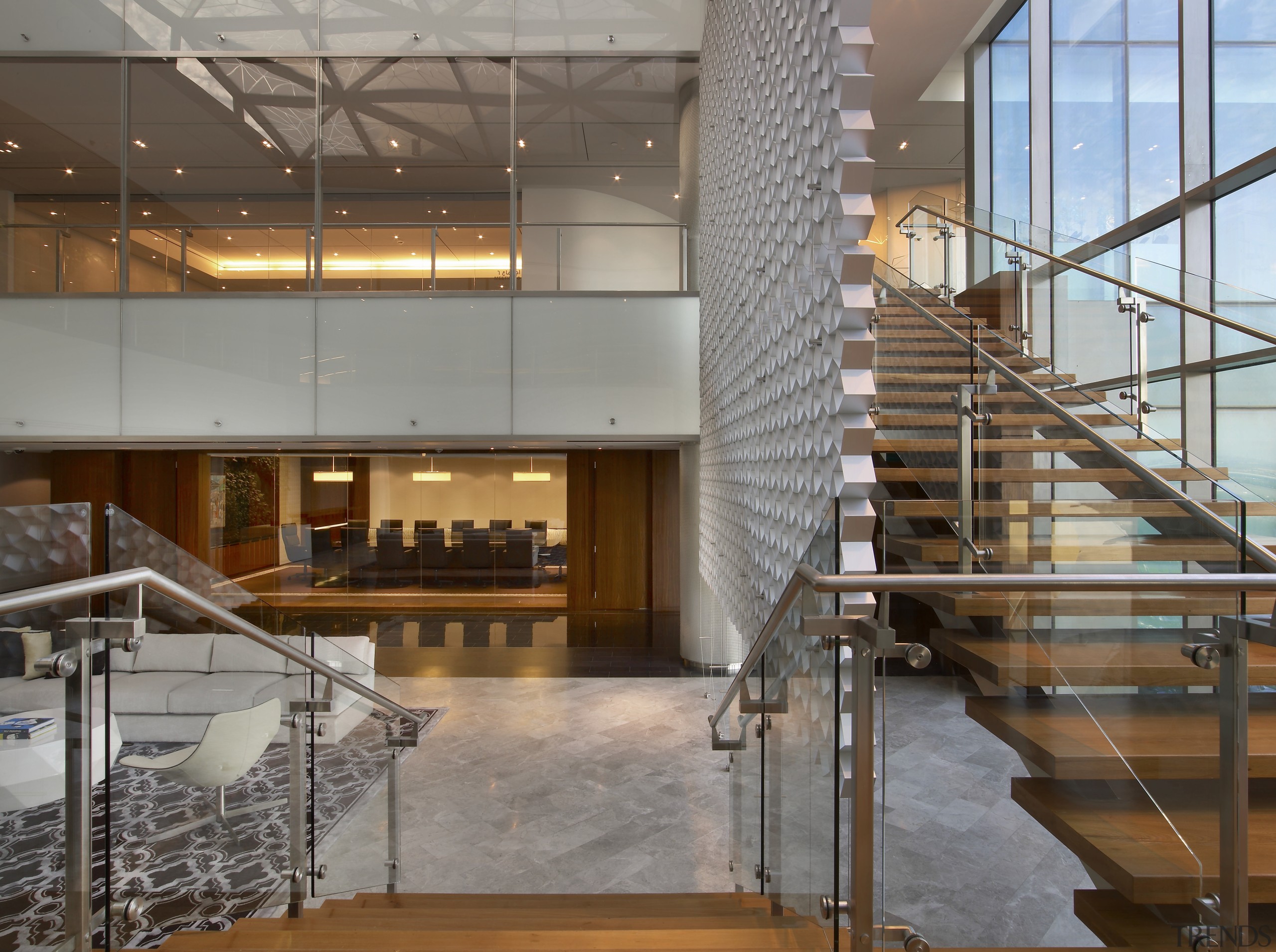 Wooden stairs with grey cutout feature wall. - architecture, ceiling, glass, handrail, interior design, lobby, stairs, gray, brown