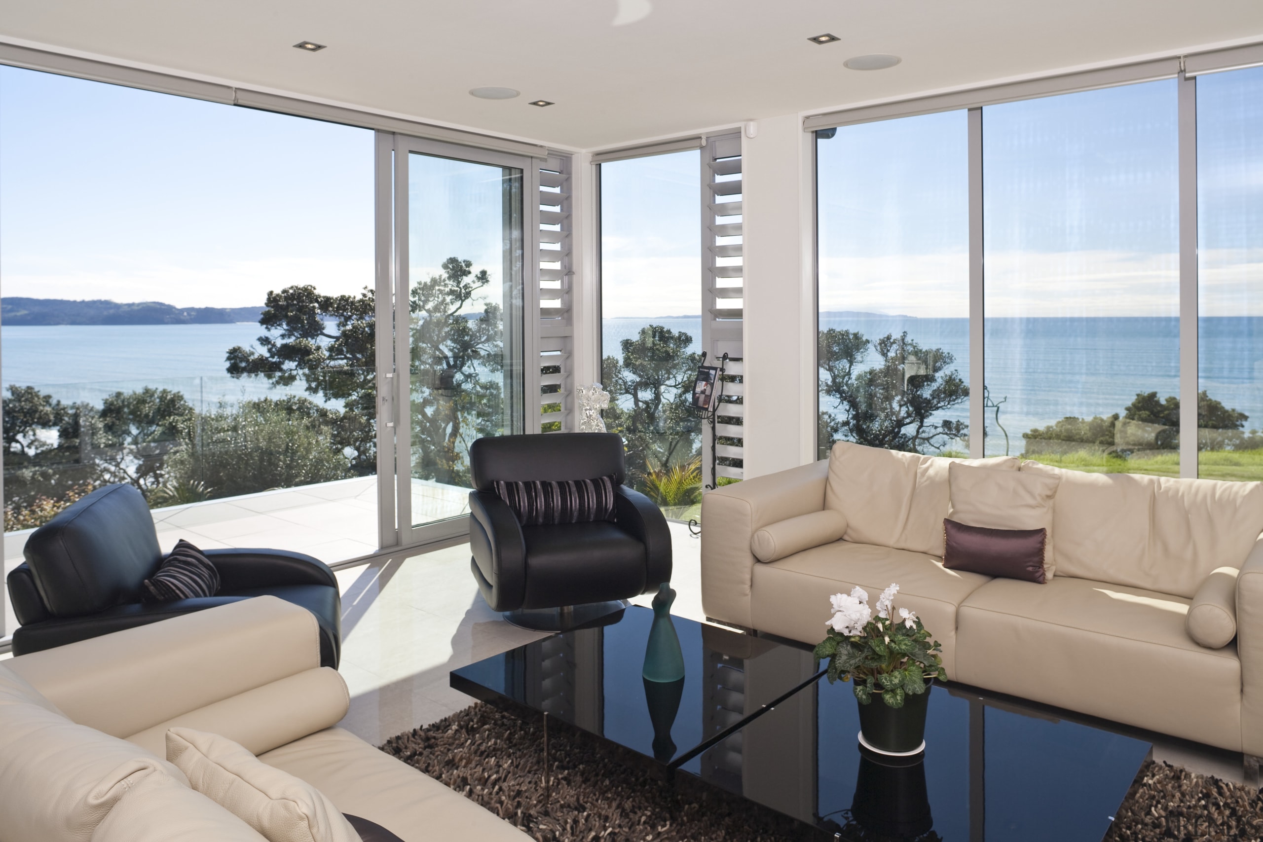 interior lounge view of a Cliff top house, estate, house, interior design, living room, penthouse apartment, property, real estate, window, gray