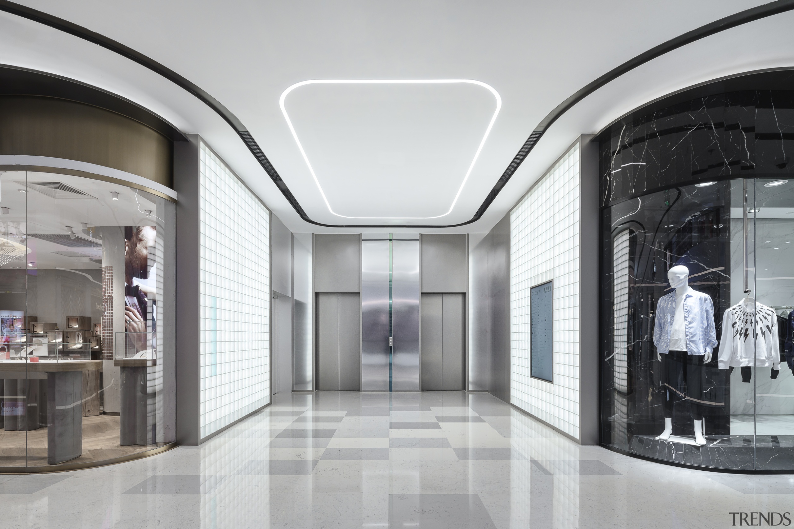 Elevator hall flanked by high-end retail. - Pixel 