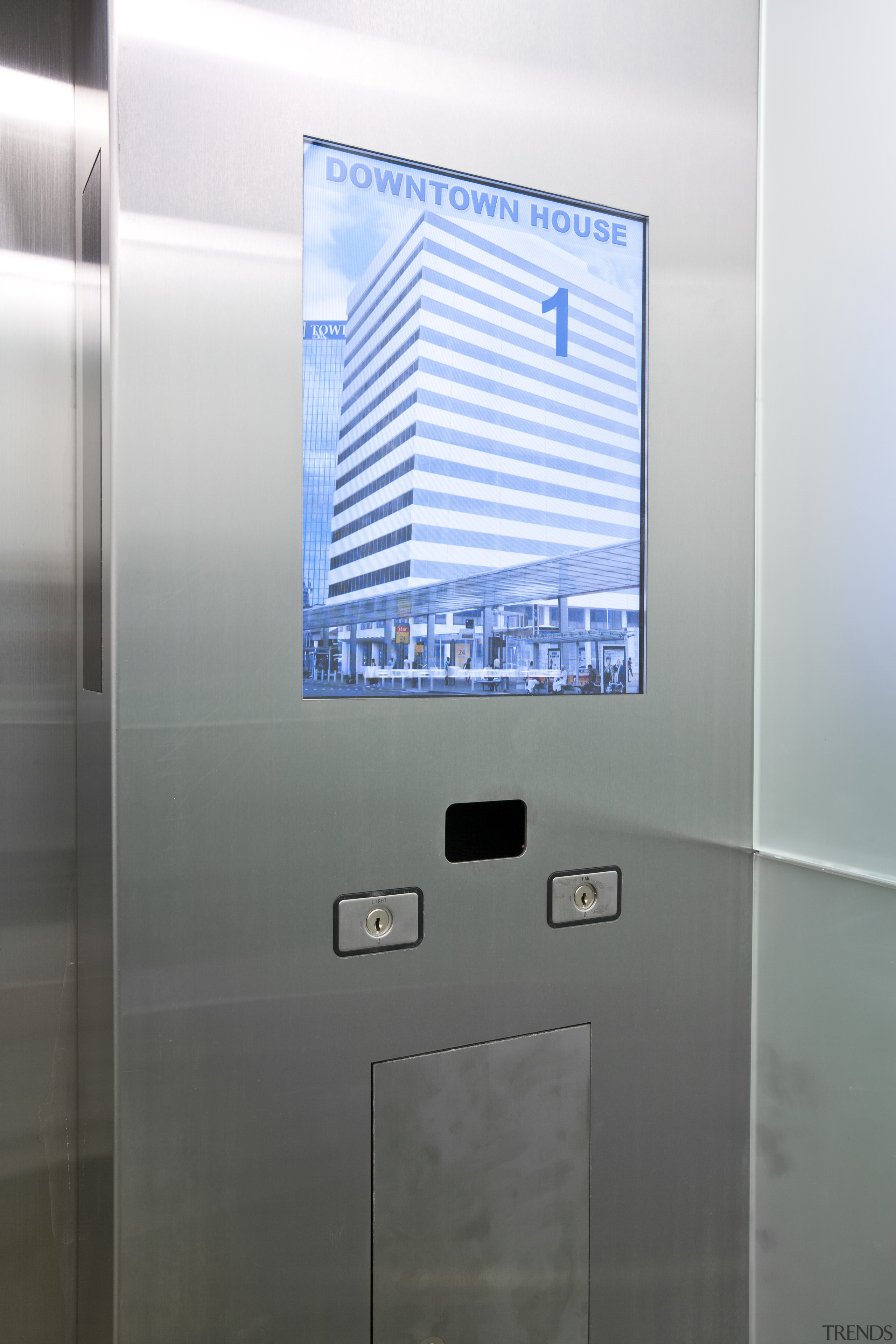 internal view of lifts at 21 Queen St daylighting, gray, white