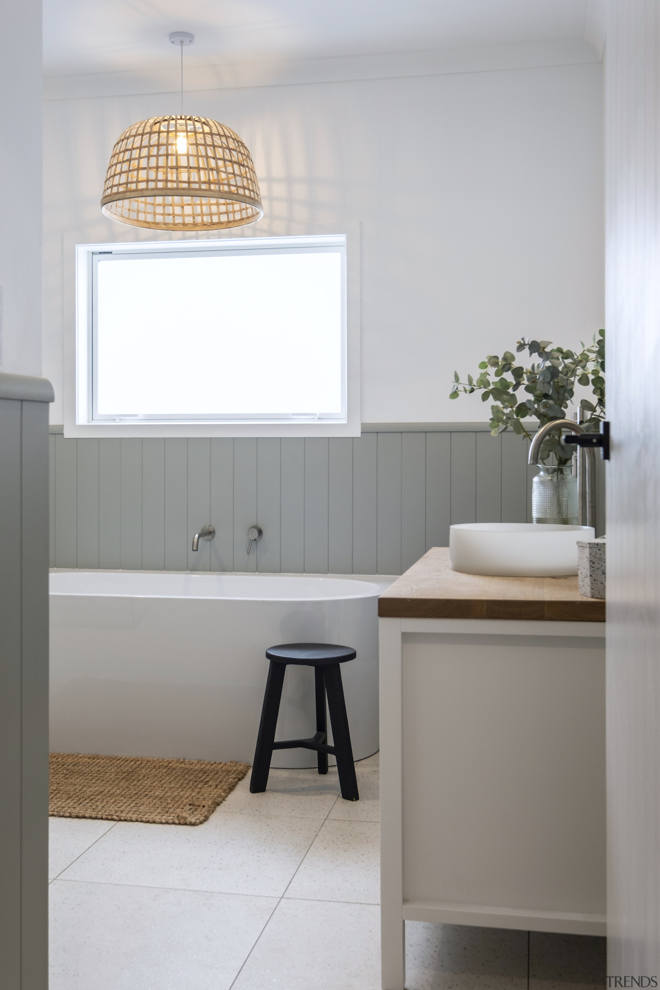 The vanity, on legs, has a furniture-like appeal. 