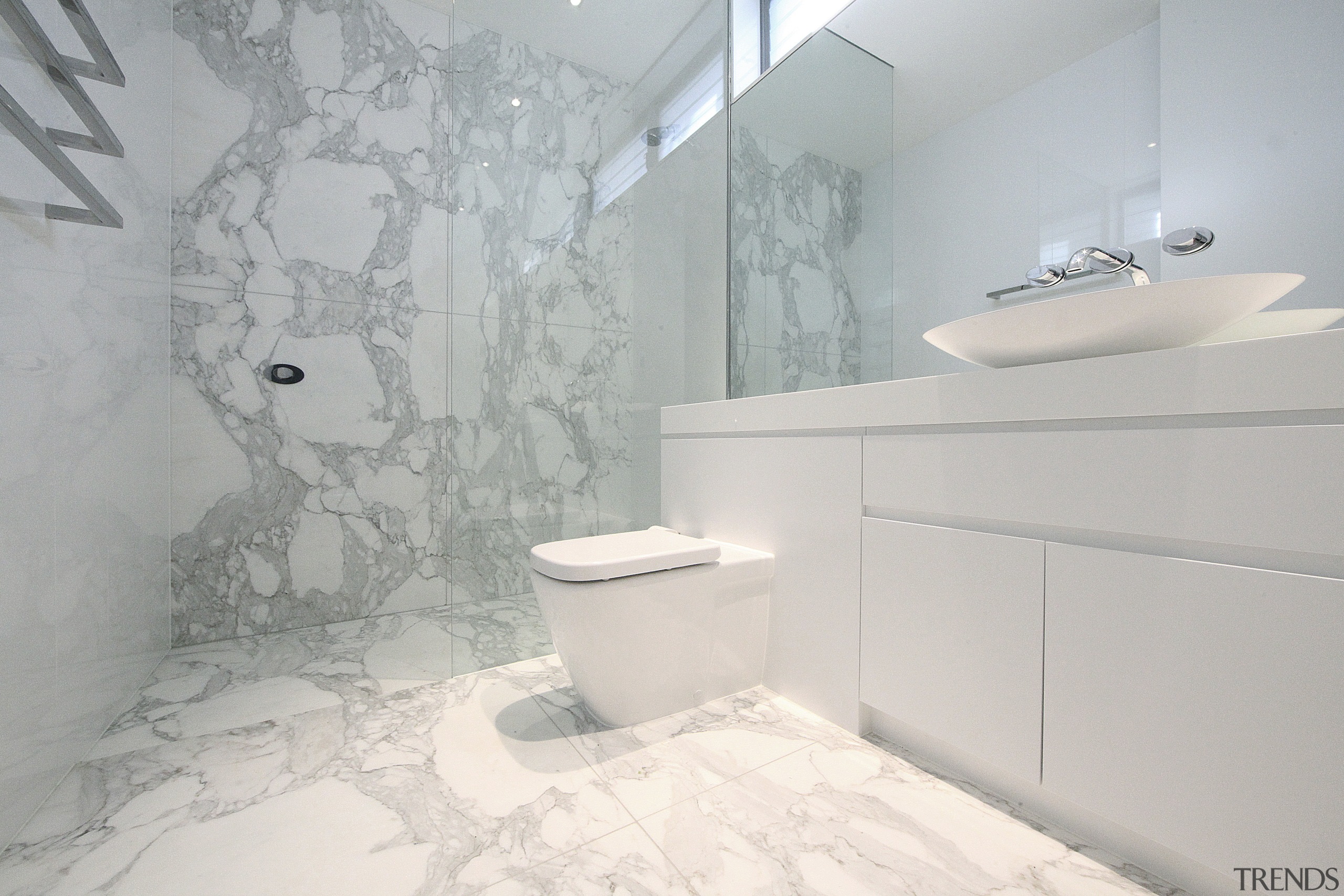 Bathroom with white vanity and toilet and marble bathroom, bidet, ceramic, floor, home, interior design, plumbing fixture, product design, property, room, tap, tile, toilet seat, wall, gray, white