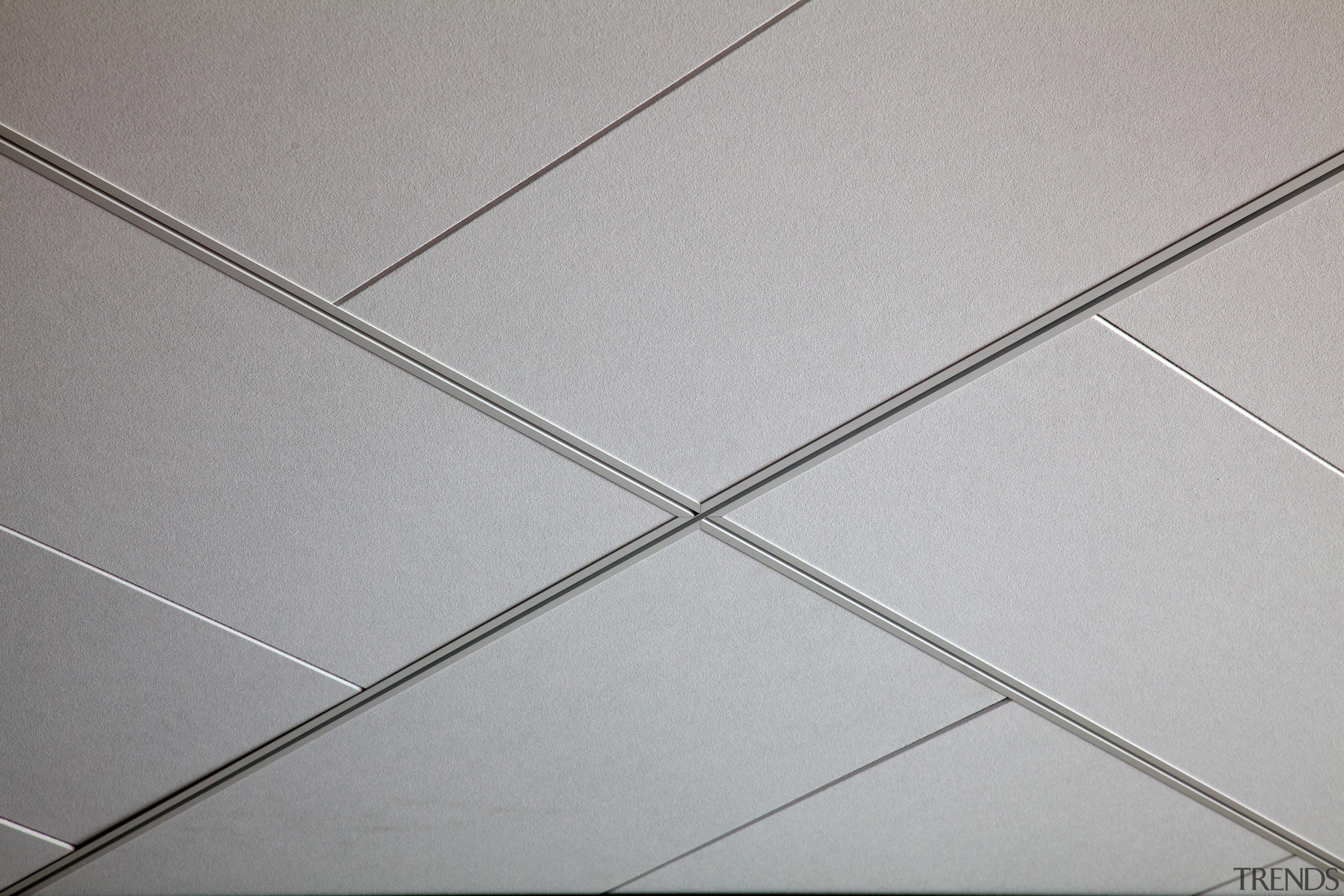 Above and beyond  the new Genesis Energy angle, ceiling, floor, line, tile, gray