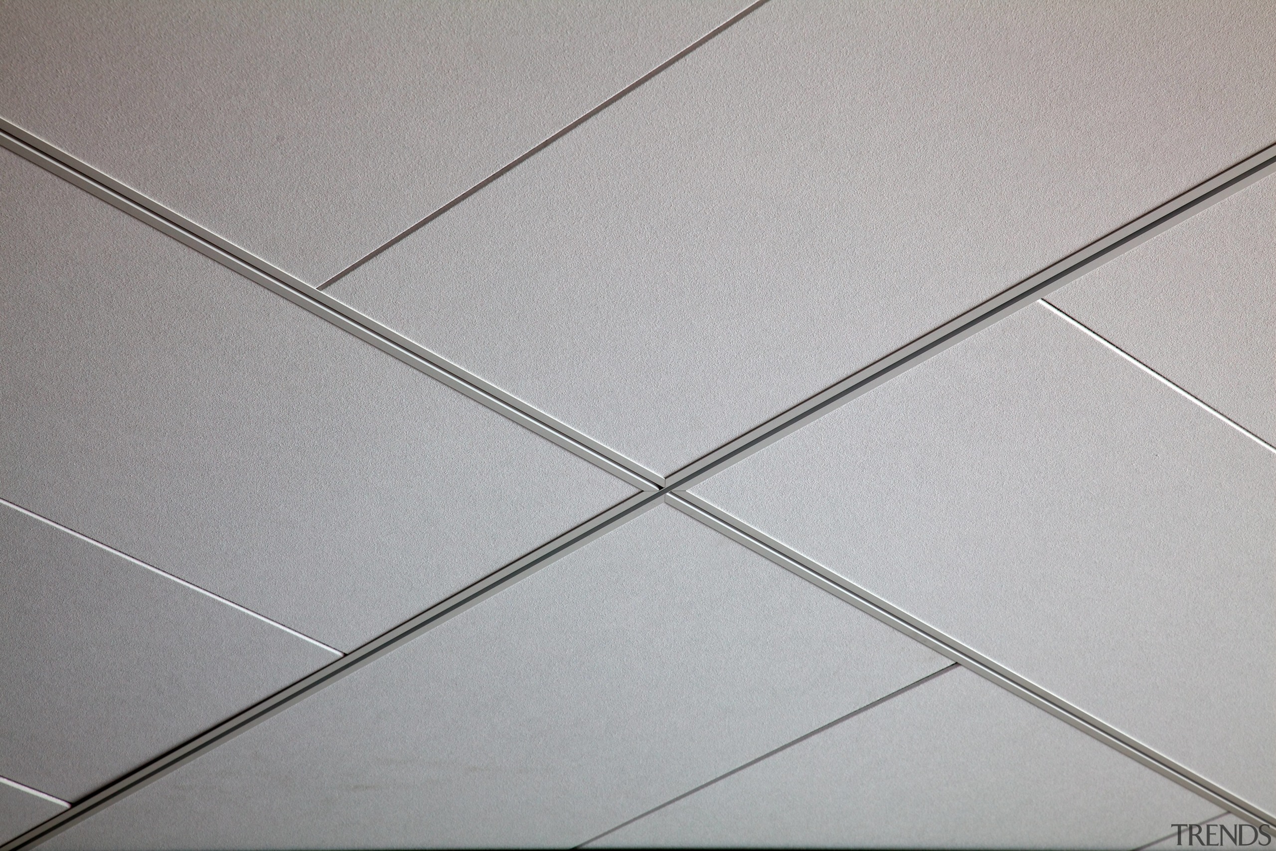 Above and beyond  the new Genesis Energy angle, ceiling, floor, line, tile, gray