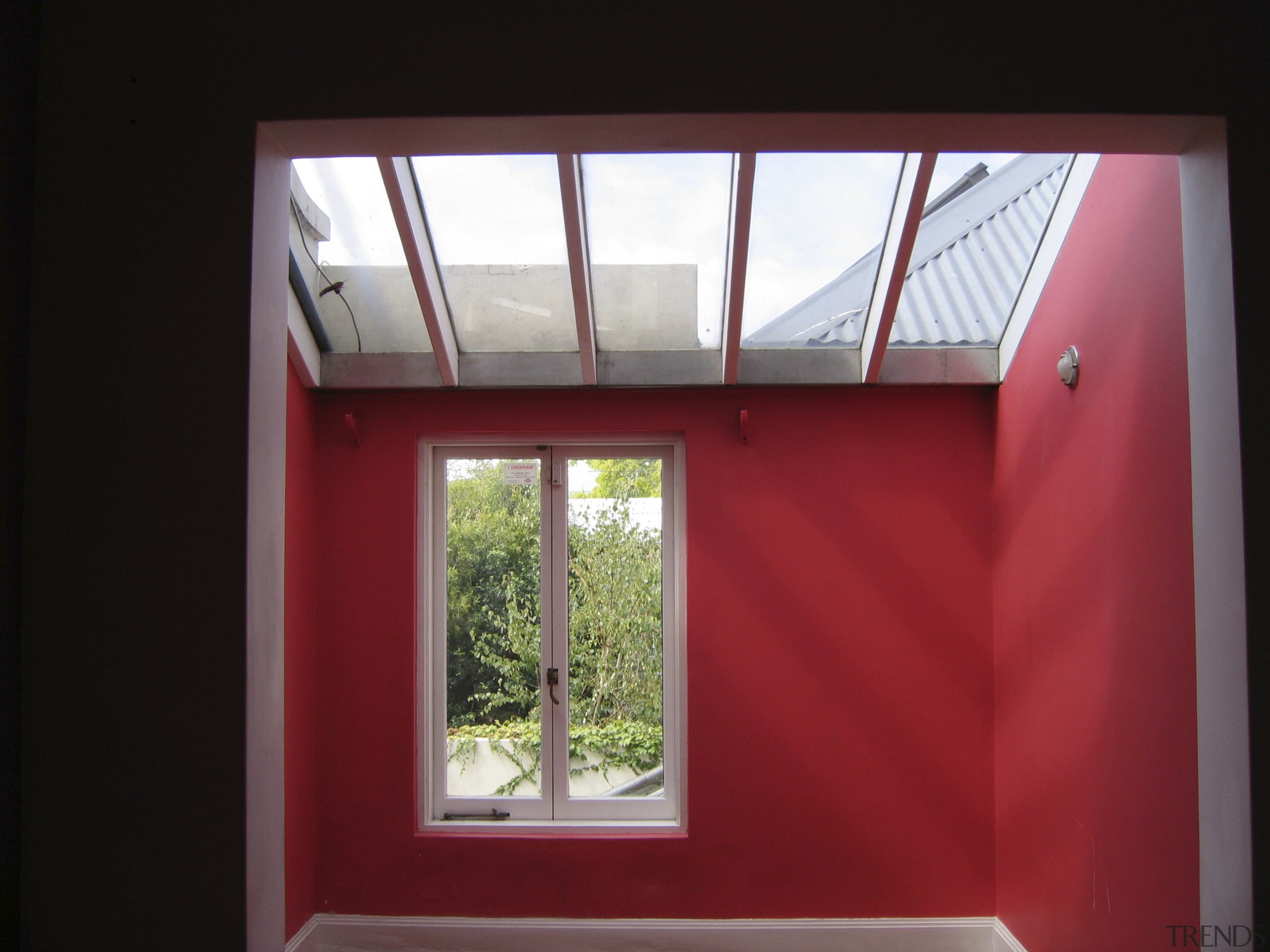 The home was renovated by Maddalena Vienna of architecture, ceiling, daylighting, house, window, red, black