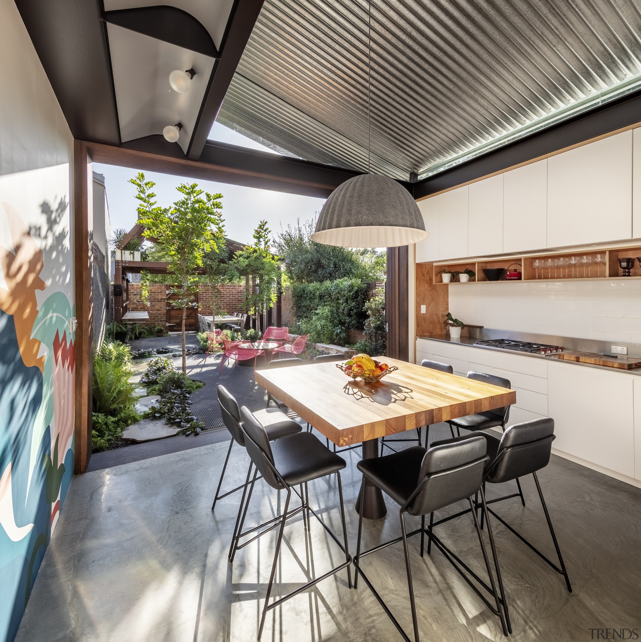 Looking from the kitchen/dining area to the third 