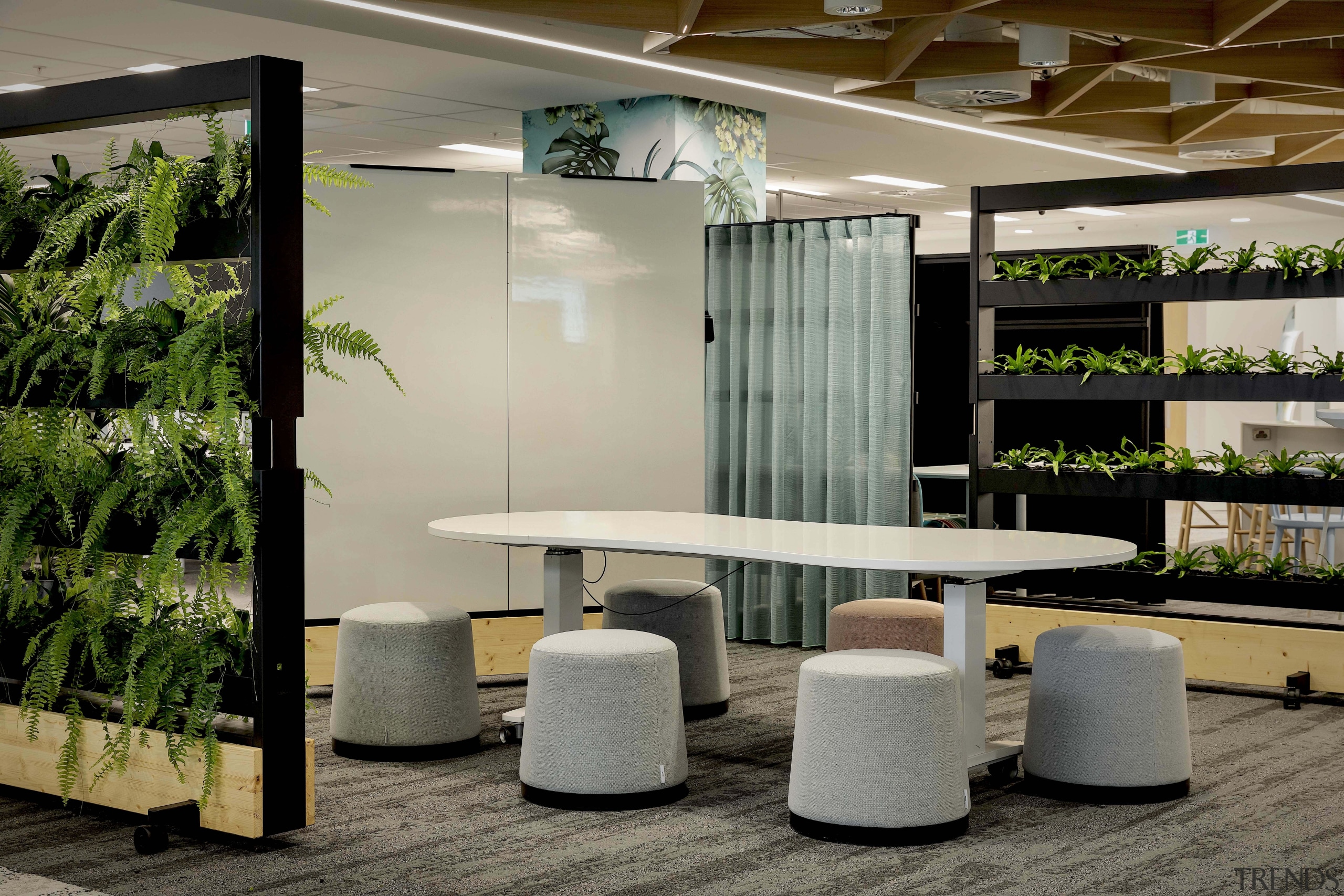 This flexible, relaxing collaboration space benefits from an gray