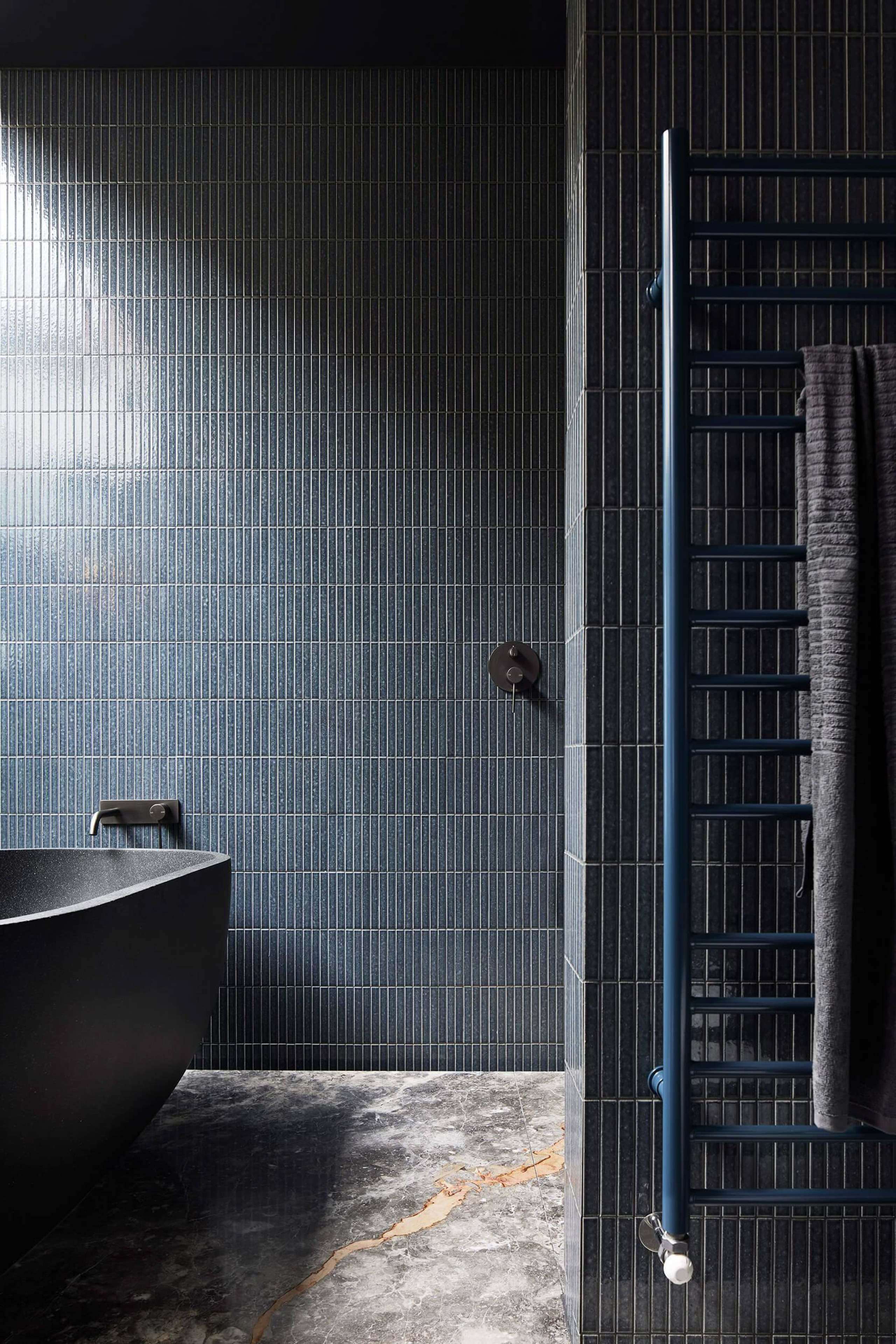 Finger tiles and a distressed stone floor add 