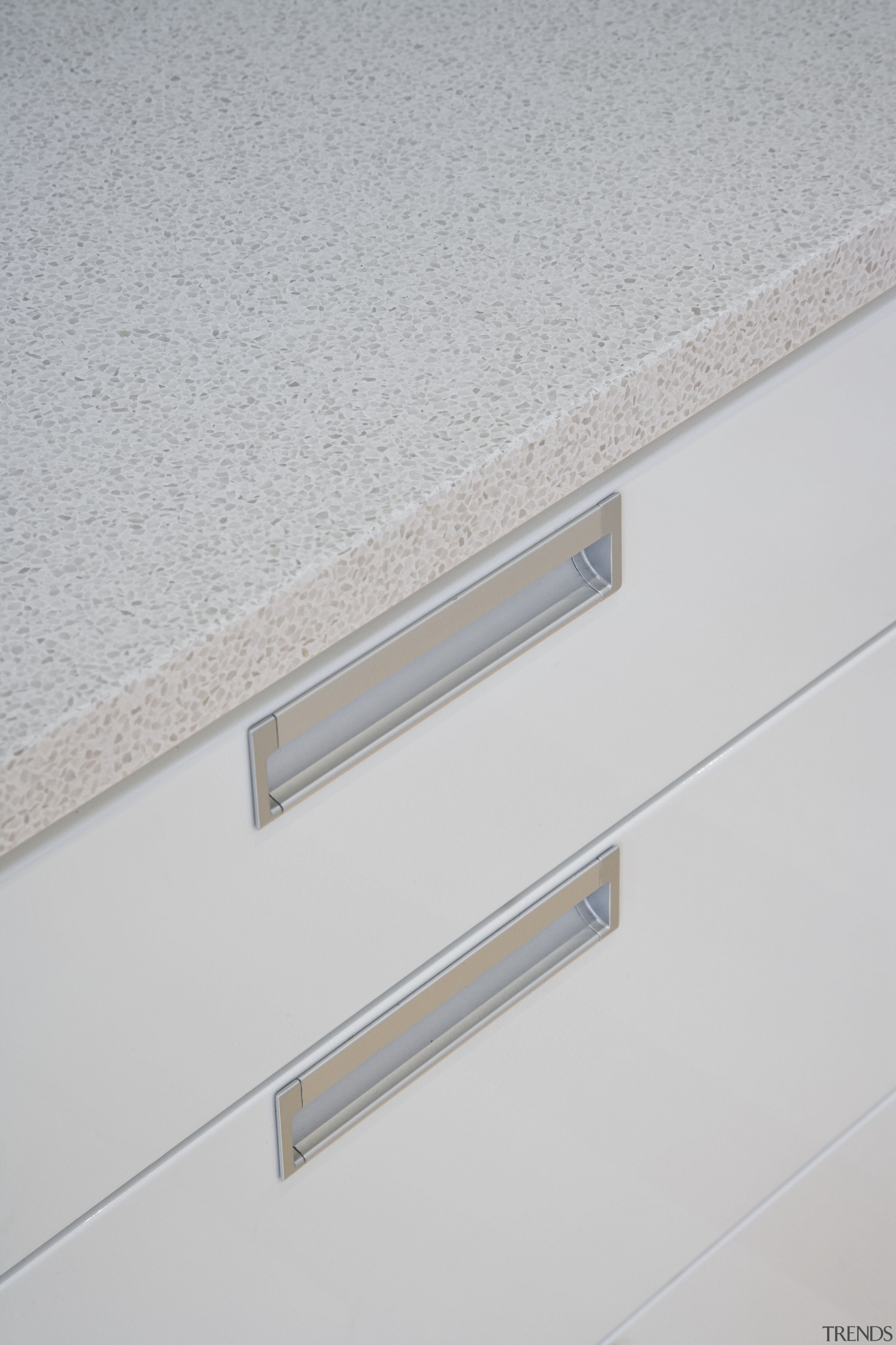 View of kitchen cabinetry with granite benchtop. - angle, lighting, line, product design, wall, gray