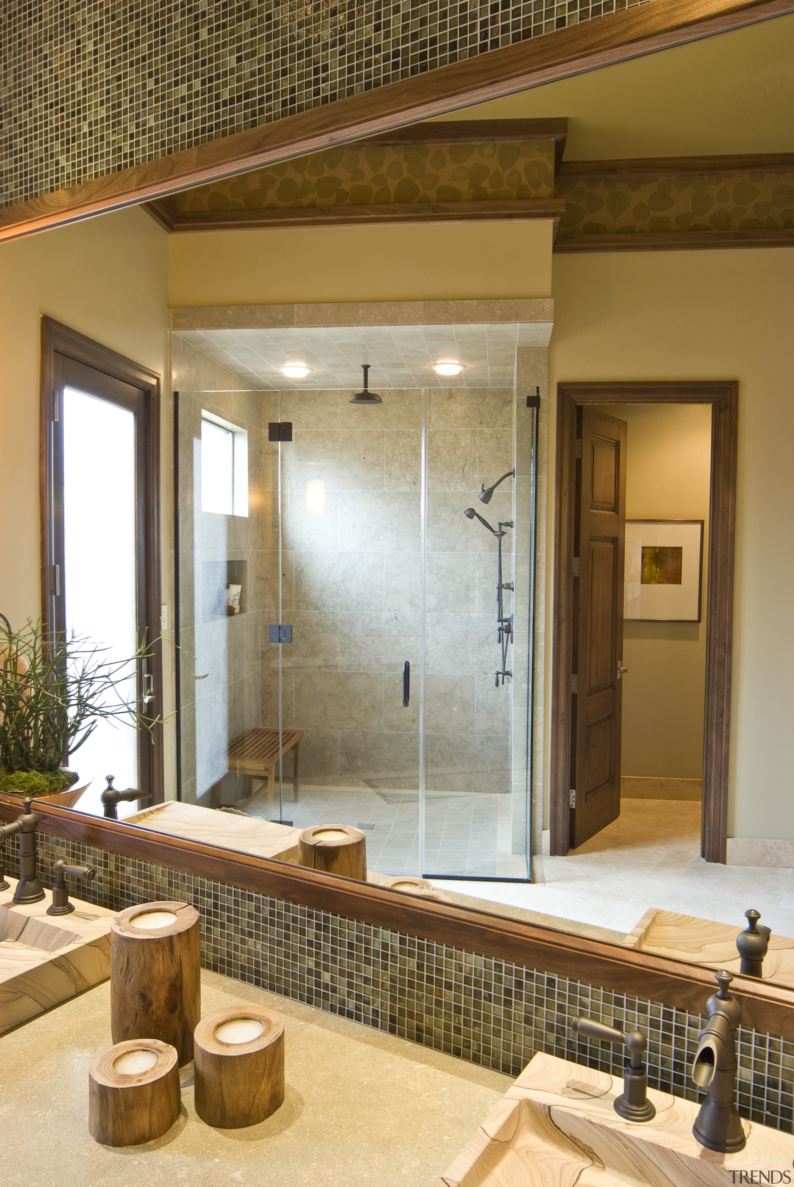 View of bathroom which feature granite wall tiles bathroom, ceiling, door, interior design, room, wall, window, brown