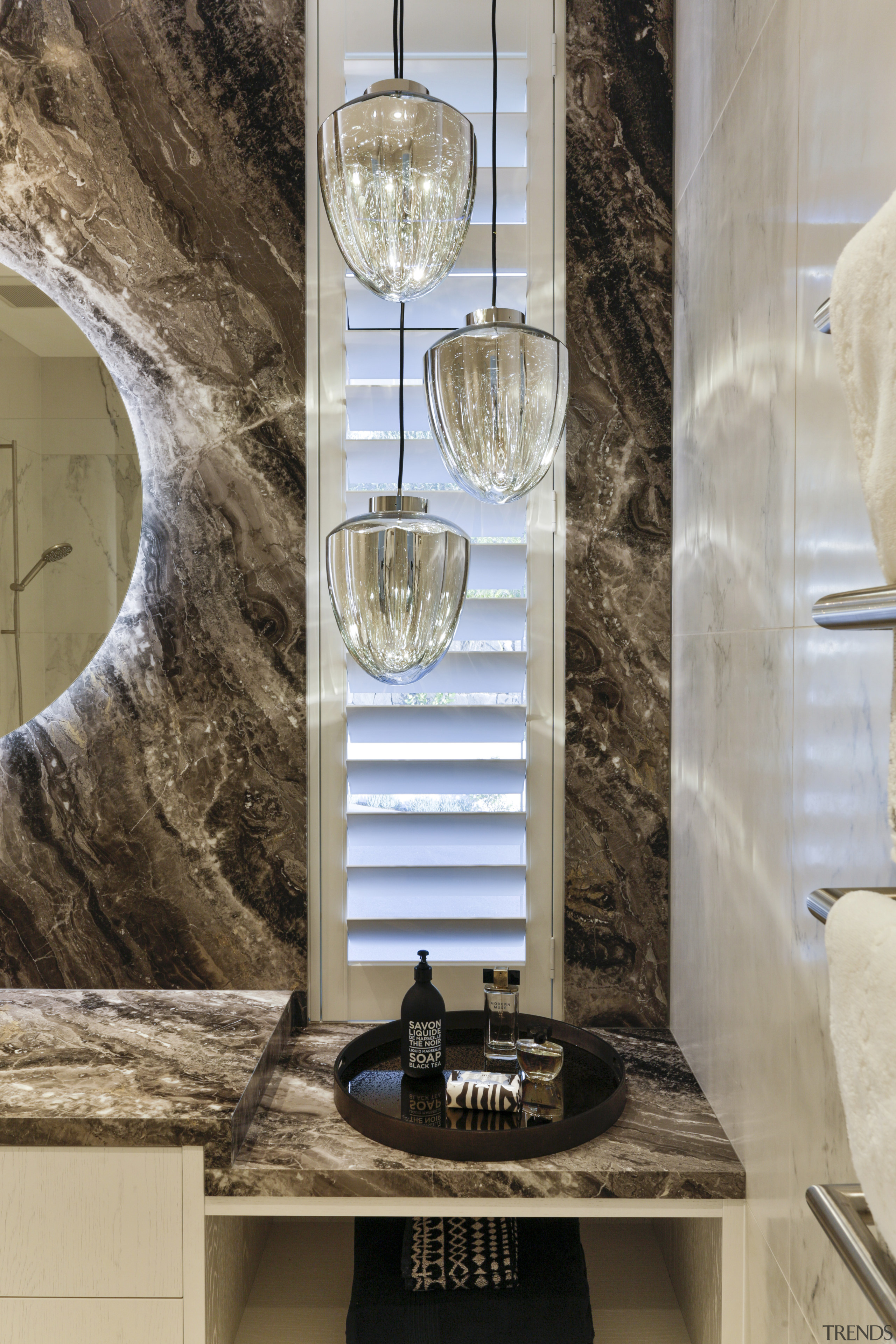 ​​​​​​​In this powder room, by designer Jennie Dunlop, gray