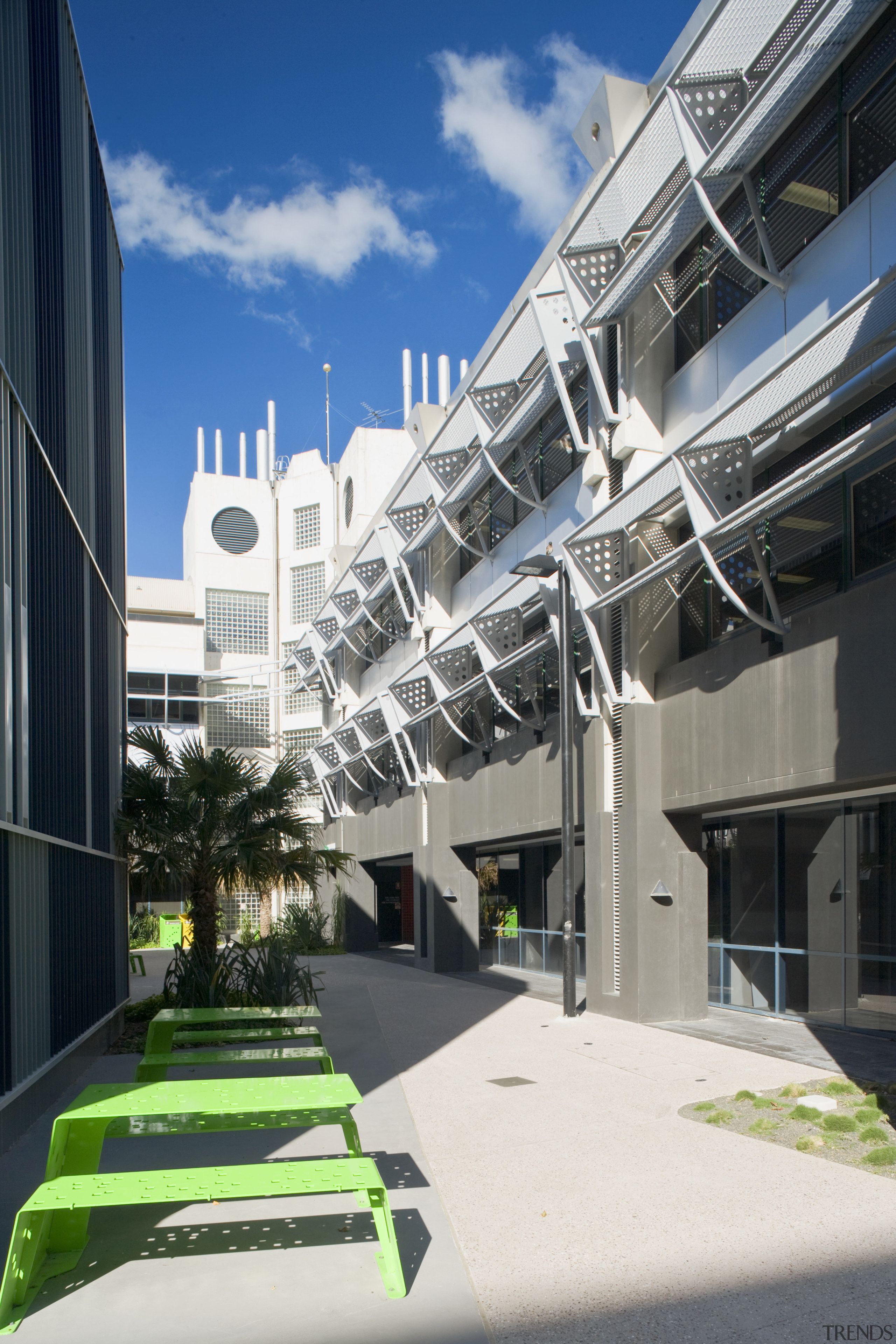 Image of a development which is part of apartment, architecture, building, commercial building, condominium, corporate headquarters, facade, headquarters, house, metropolitan area, mixed use, real estate, residential area, urban design, black