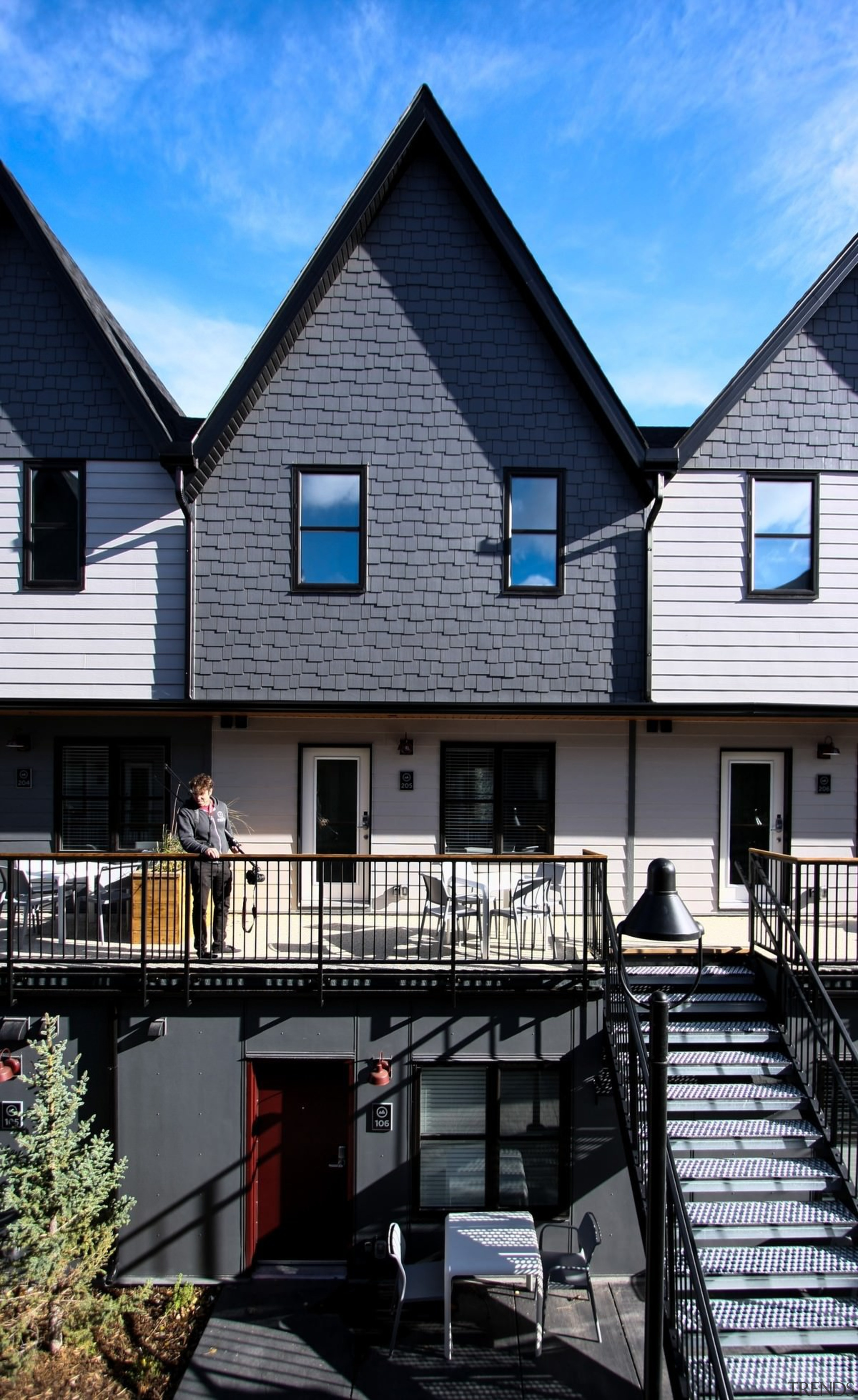 One of the gabled roofs - One of architecture, building, cottage, facade, home, house, neighbourhood, property, real estate, residential area, roof, siding, sky, suburb, window, black