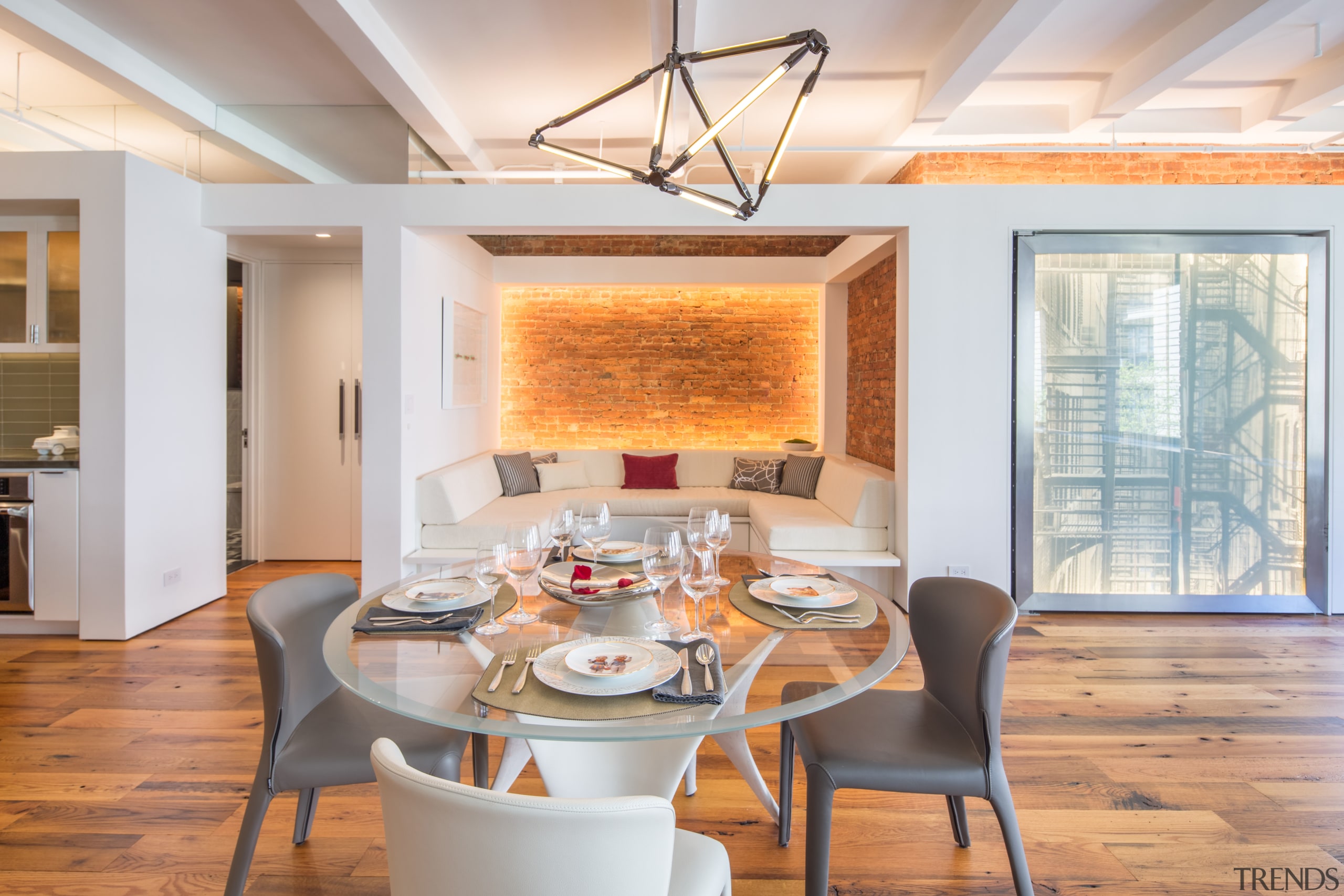 Dating back to the 1900s, this New York ceiling, dining room, hardwood, home, interior design, living room, real estate, room, table, wall, window, gray, orange