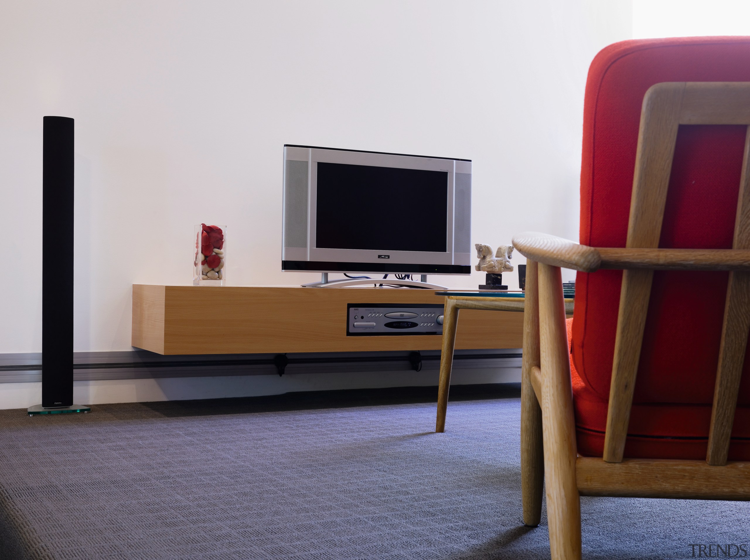 A view of a power track by Eubiq. chest of drawers, coffee table, desk, floor, furniture, interior design, living room, product design, shelf, shelving, table, wood, white