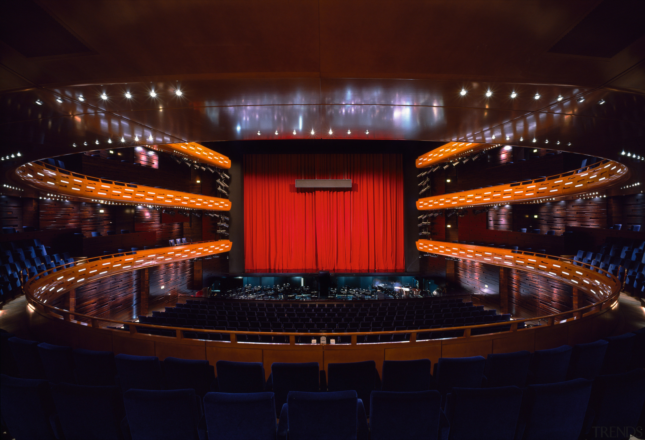 A view of the auditorium. - A view auditorium, concert hall, entertainment, lighting, night, performing arts center, stage, theatre, red, black