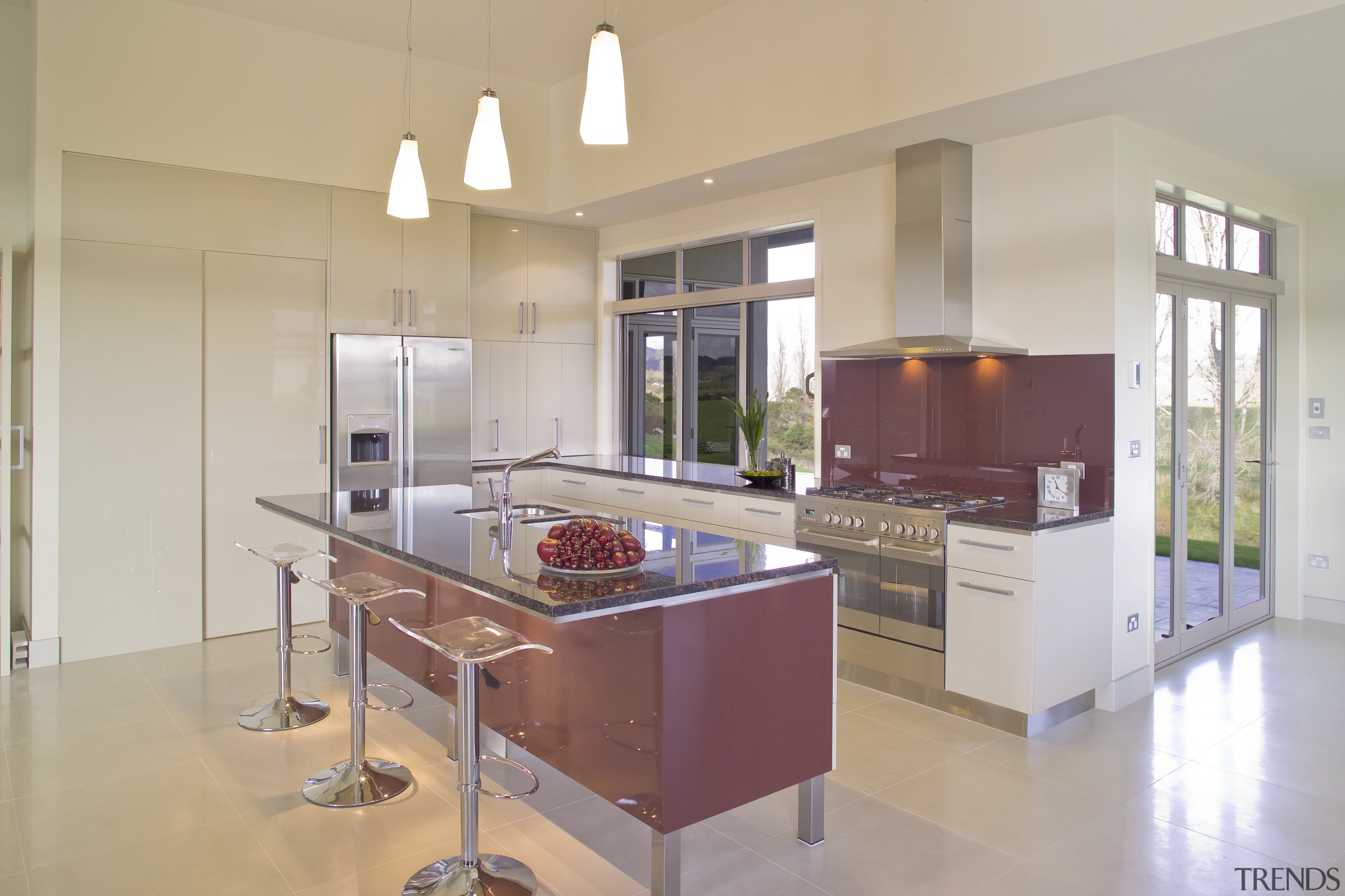 View of kitchens designed by Kira Gray of cabinetry, countertop, cuisine classique, interior design, kitchen, real estate, room, gray, orange