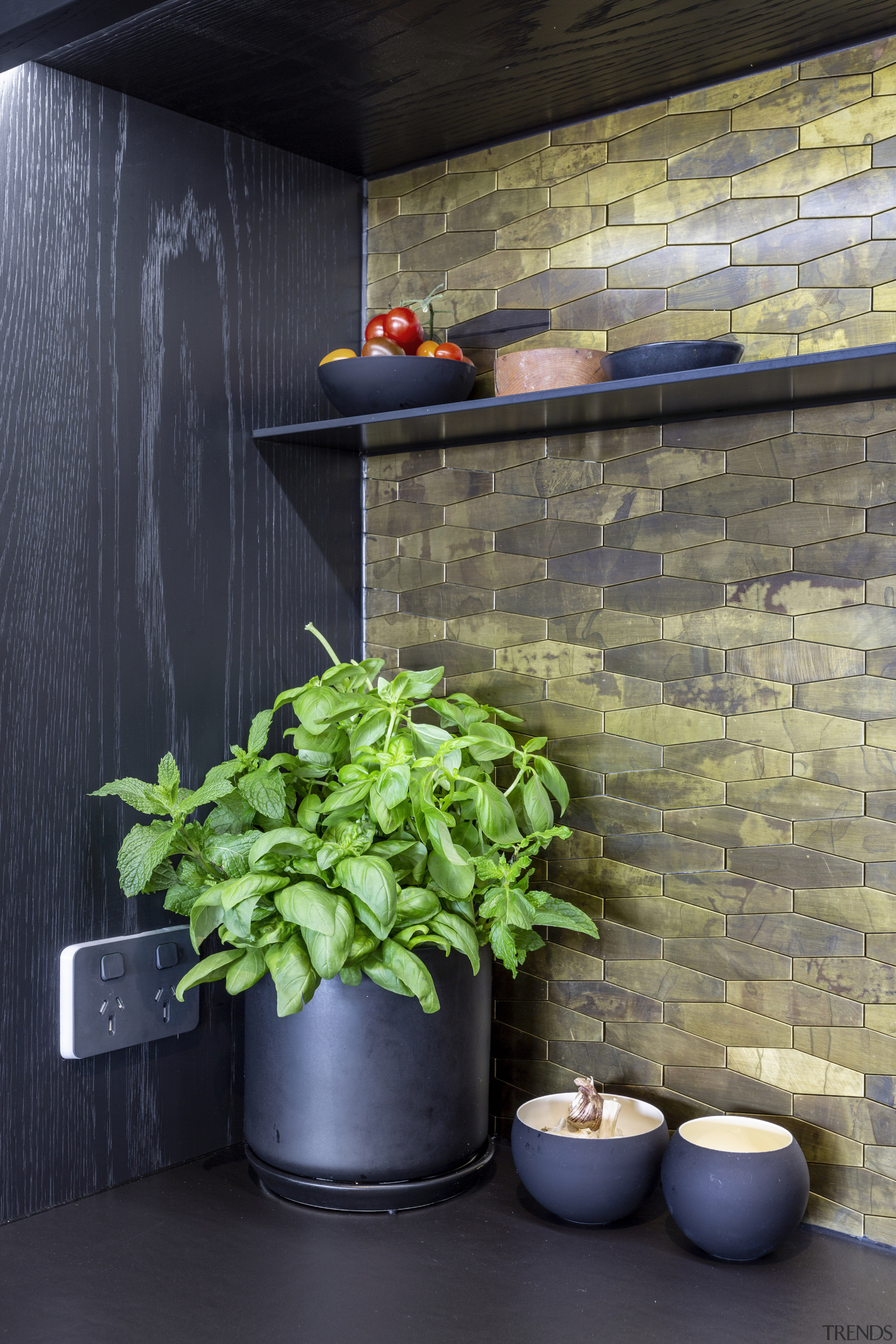 Textured mosaic tiles help to create a warm 