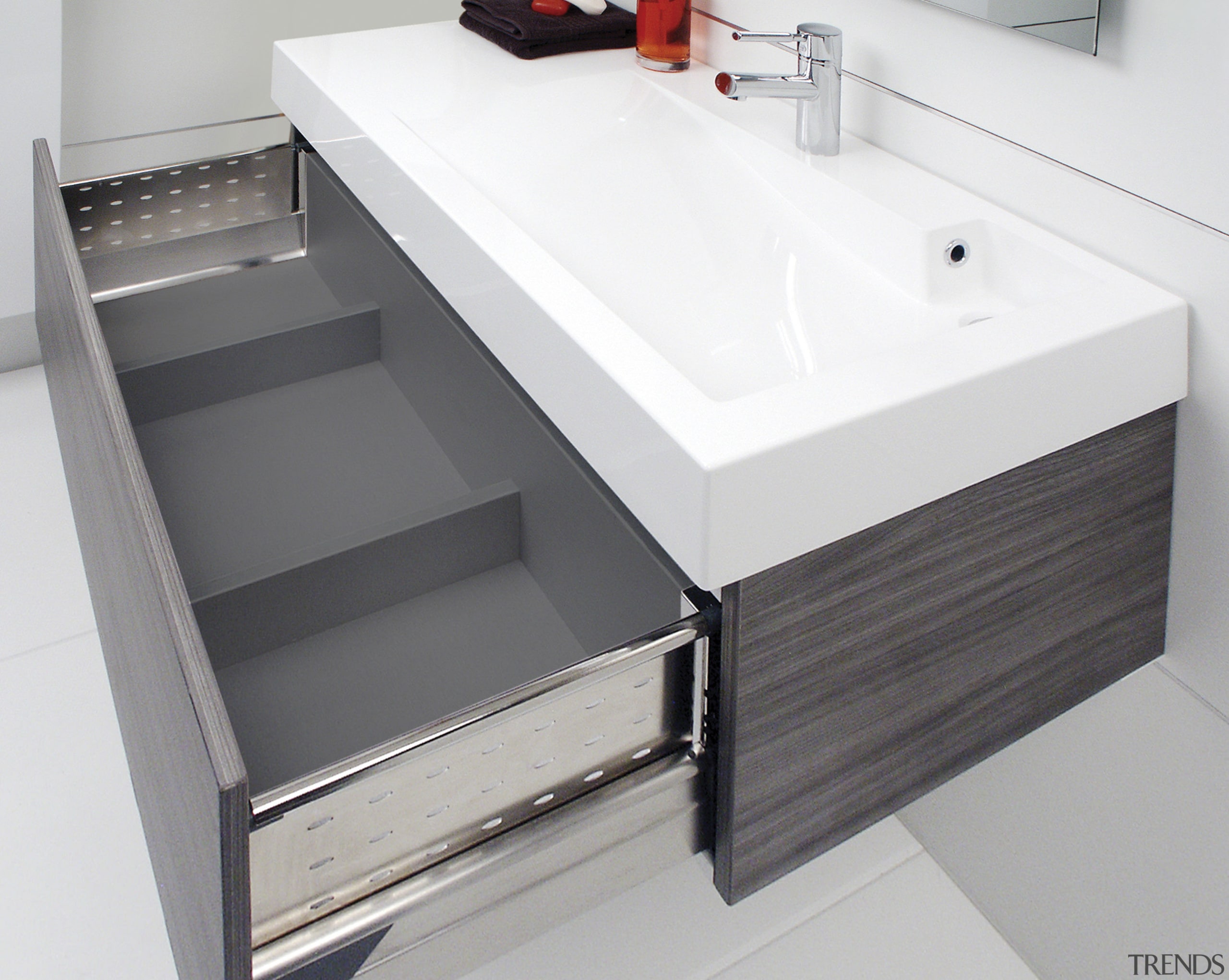 The Glide vanity features strong, smooth-gliding Blumotion opening bathroom, bathroom accessory, bathroom cabinet, bathroom sink, drawer, furniture, plumbing fixture, product, product design, sink, tap, white, gray