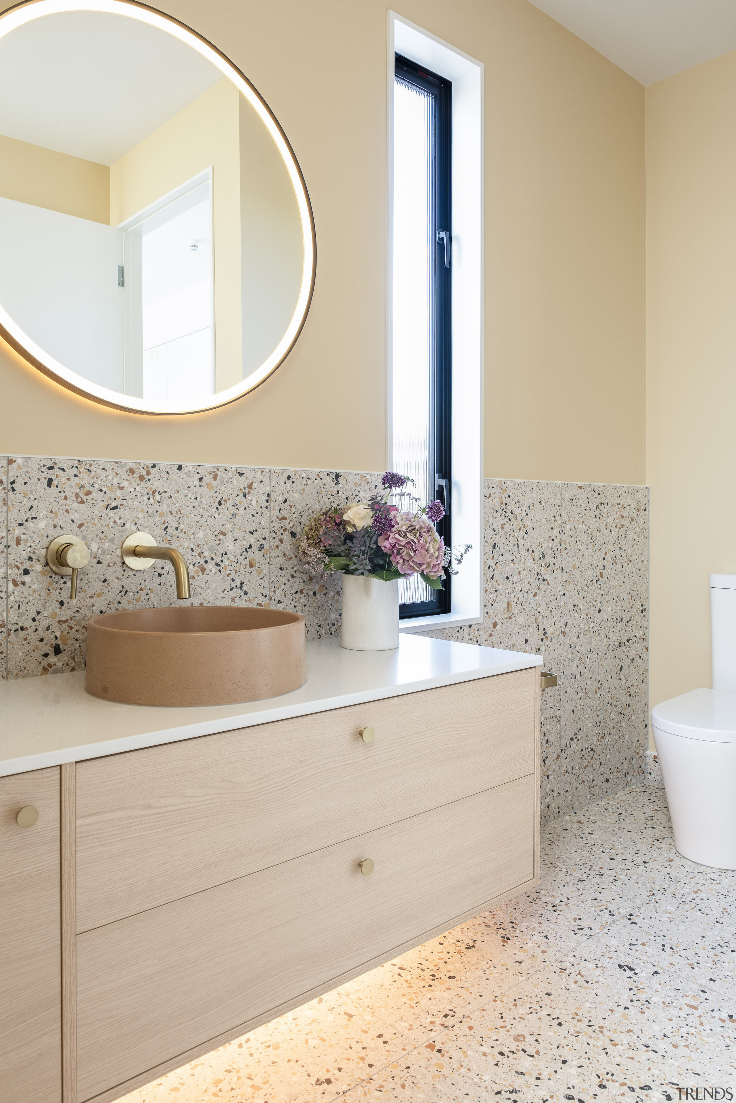 Master ensuite with orange flecked terrazzo. 