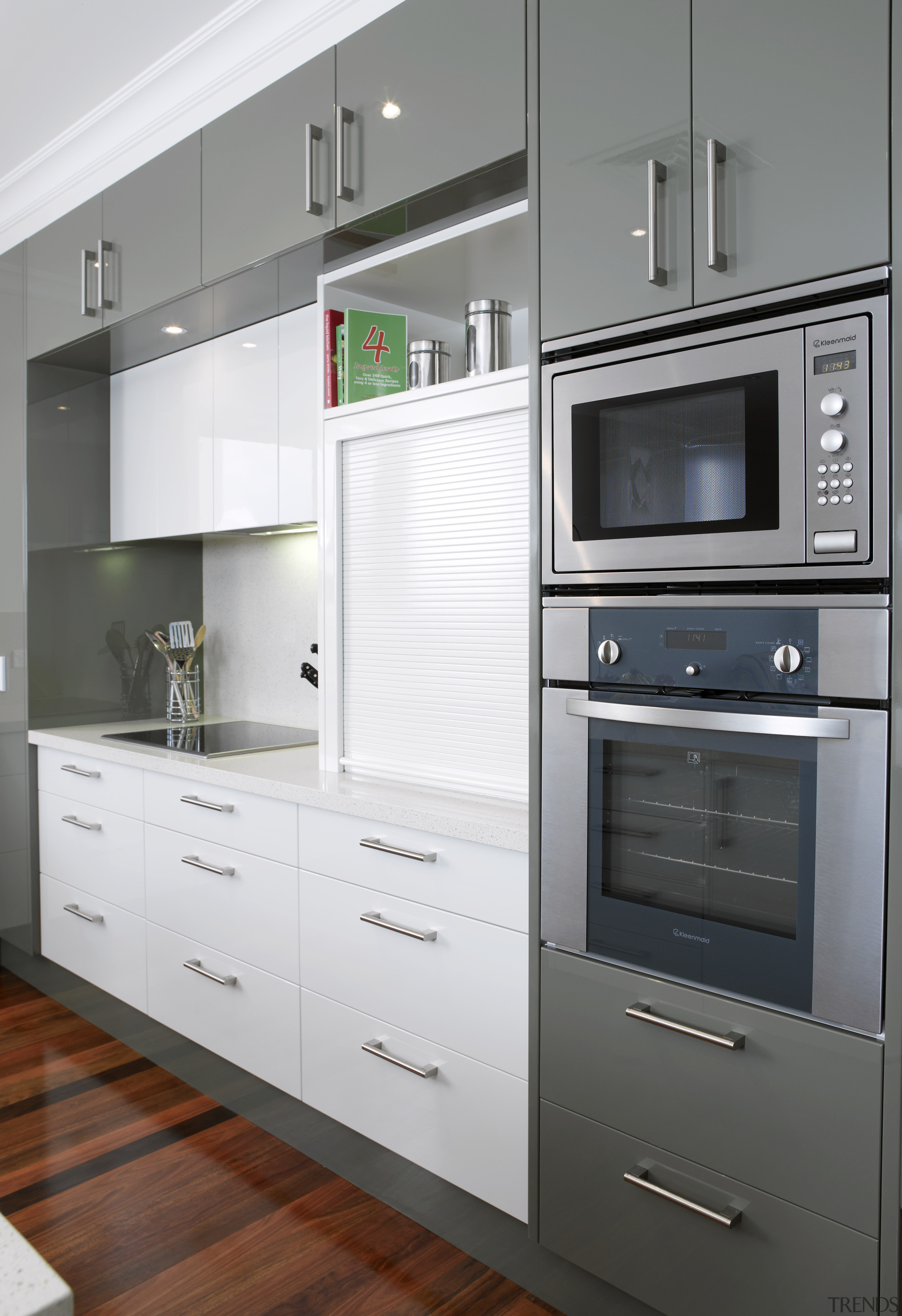 An induction hob and concealed rangehood make understand cabinetry, countertop, cuisine classique, home appliance, kitchen, kitchen appliance, kitchen stove, major appliance, gray, white