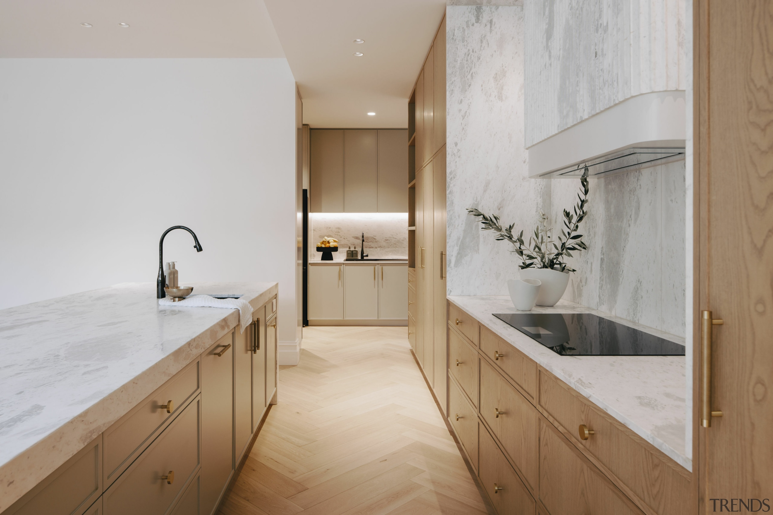 The open-plan kitchen leads to the butler’s pantry 