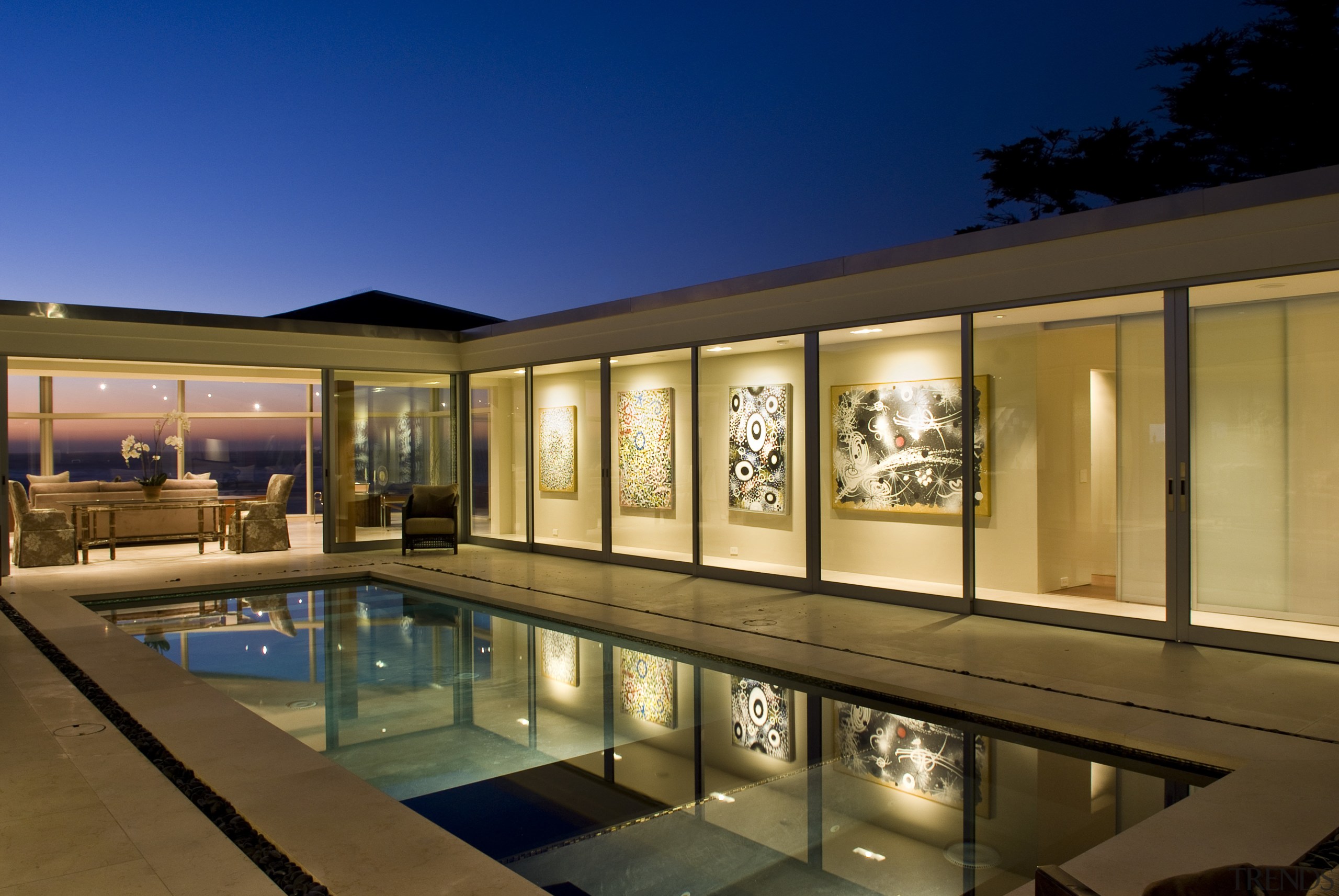View of the oceanfront Butterfly House in Carmel apartment, architecture, condominium, estate, home, house, lighting, property, real estate, reflection, swimming pool, villa, window, brown, blue