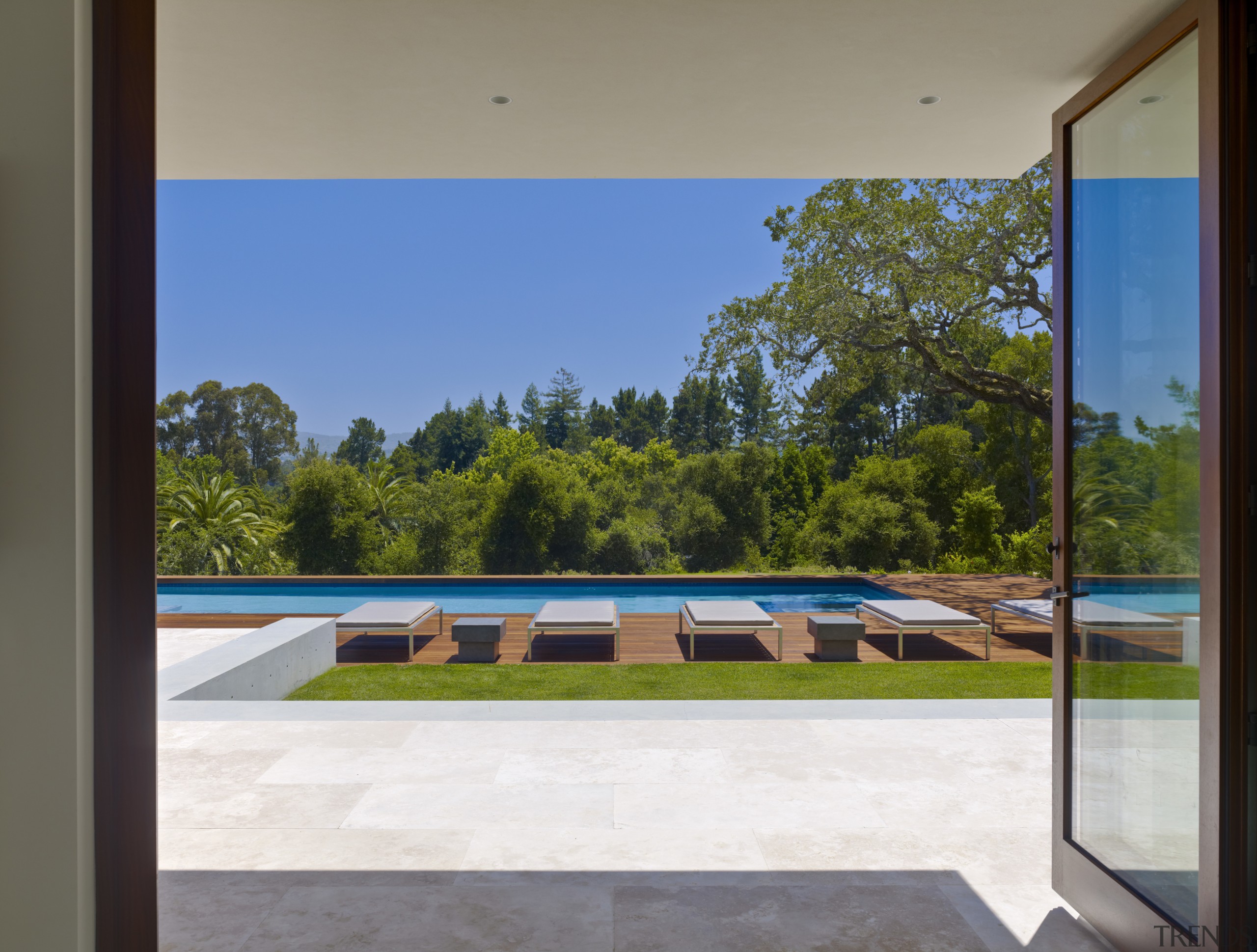 View of the pool area from the custom architecture, daylighting, estate, home, house, interior design, property, real estate, sky, window, gray