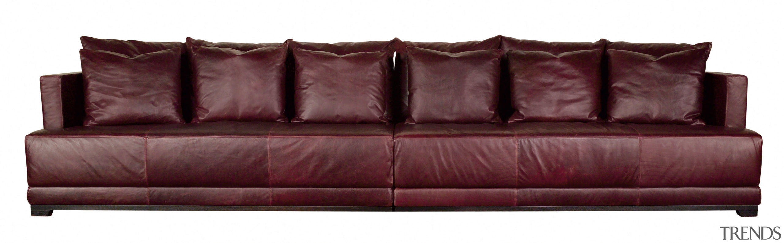 View of a very long, square brown leather couch, furniture, loveseat, sofa bed, red, white