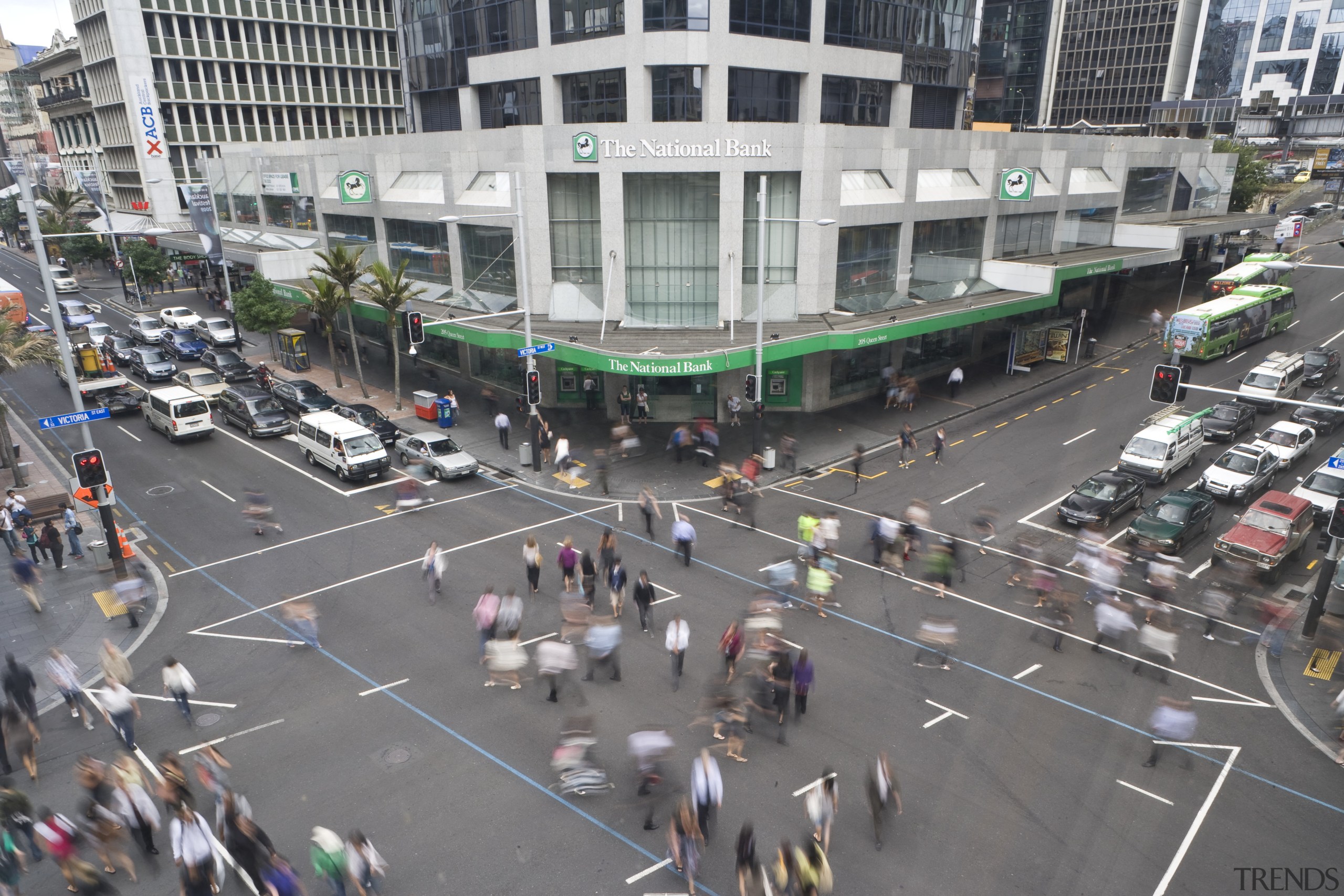 Image of the beautiful Auckland City. - Image car, city, crowd, downtown, intersection, lane, metropolis, metropolitan area, pedestrian, pedestrian crossing, road, street, town square, urban area, vehicle, gray