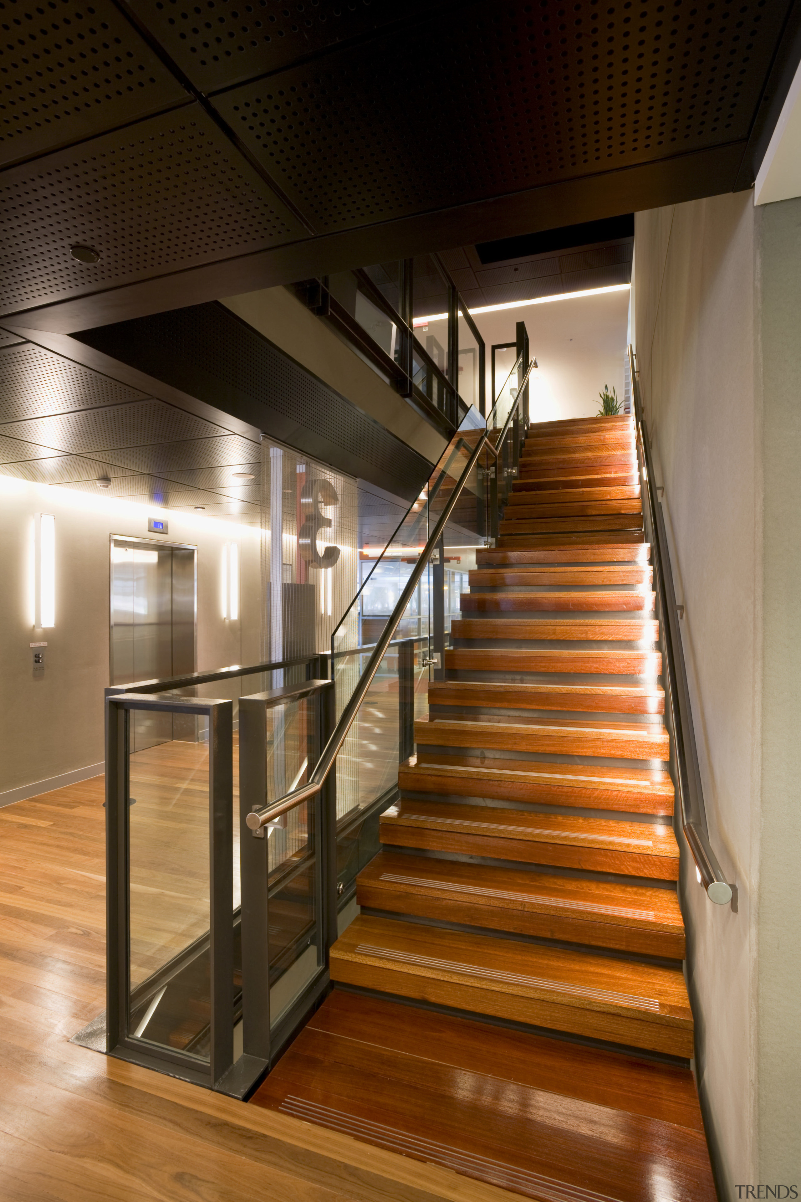 Timber flooring throughout the bank features grey ironbark architecture, daylighting, glass, handrail, interior design, stairs, wood, brown