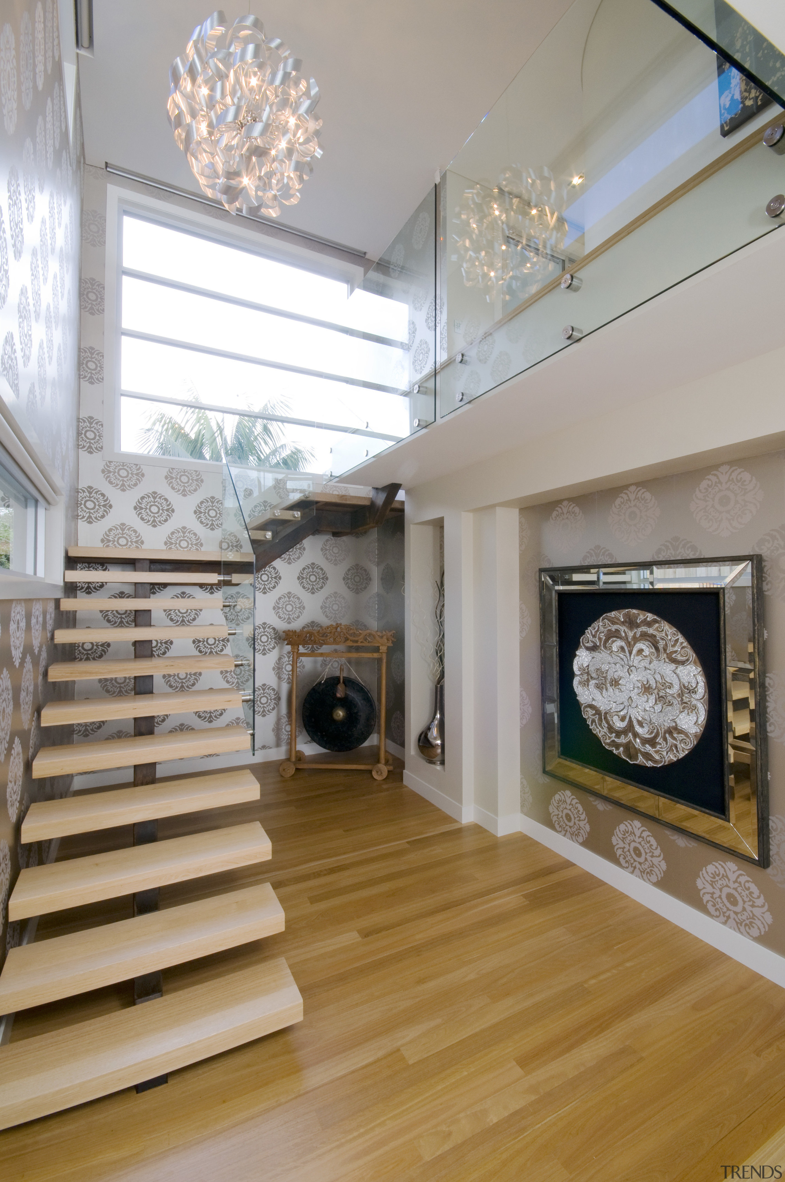 view of a stairway in this home designed ceiling, daylighting, floor, flooring, hardwood, home, interior design, living room, room, stairs, wood flooring, gray