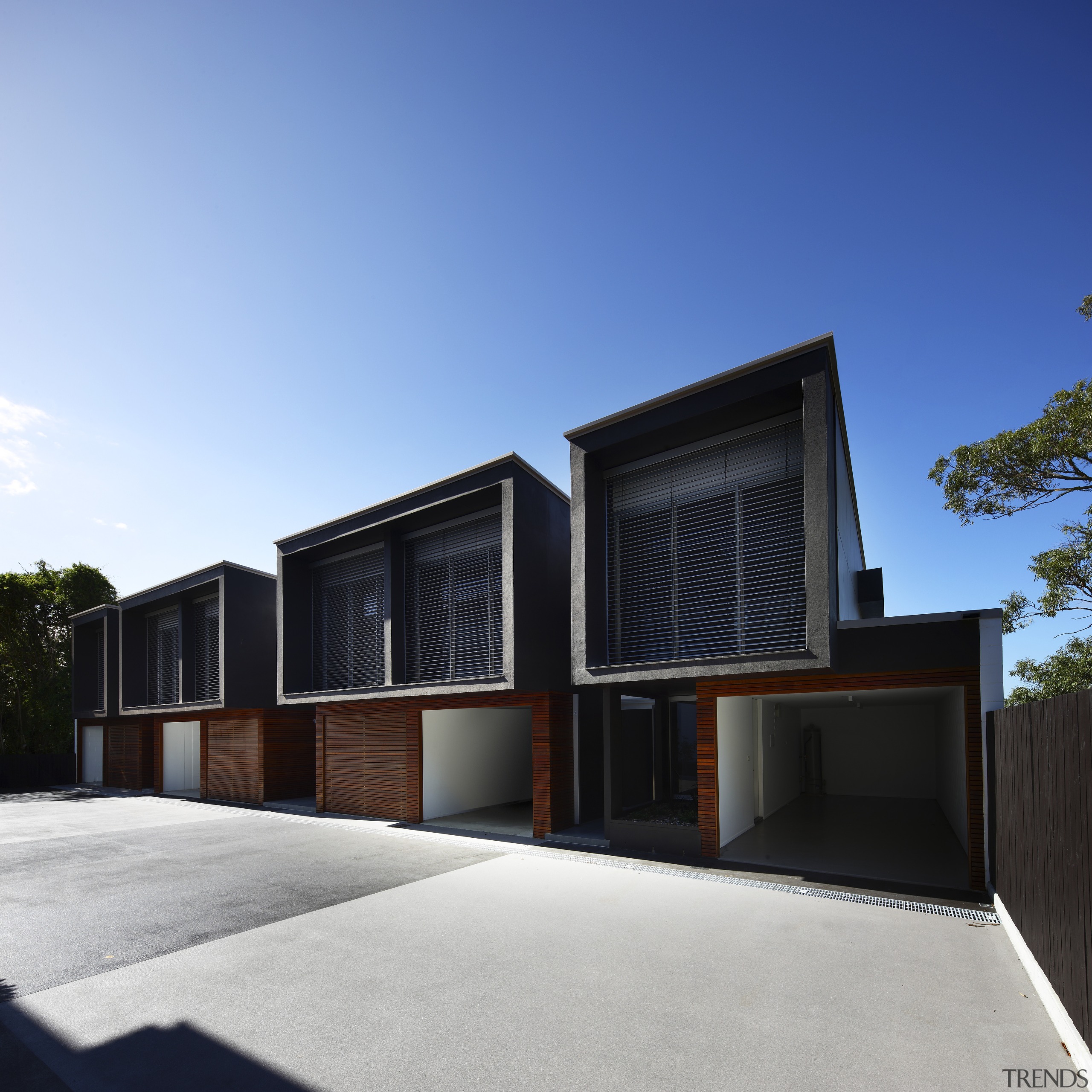 Exterior view of contemporary townhouses. - Exterior view architecture, building, elevation, facade, home, house, real estate, residential area, teal