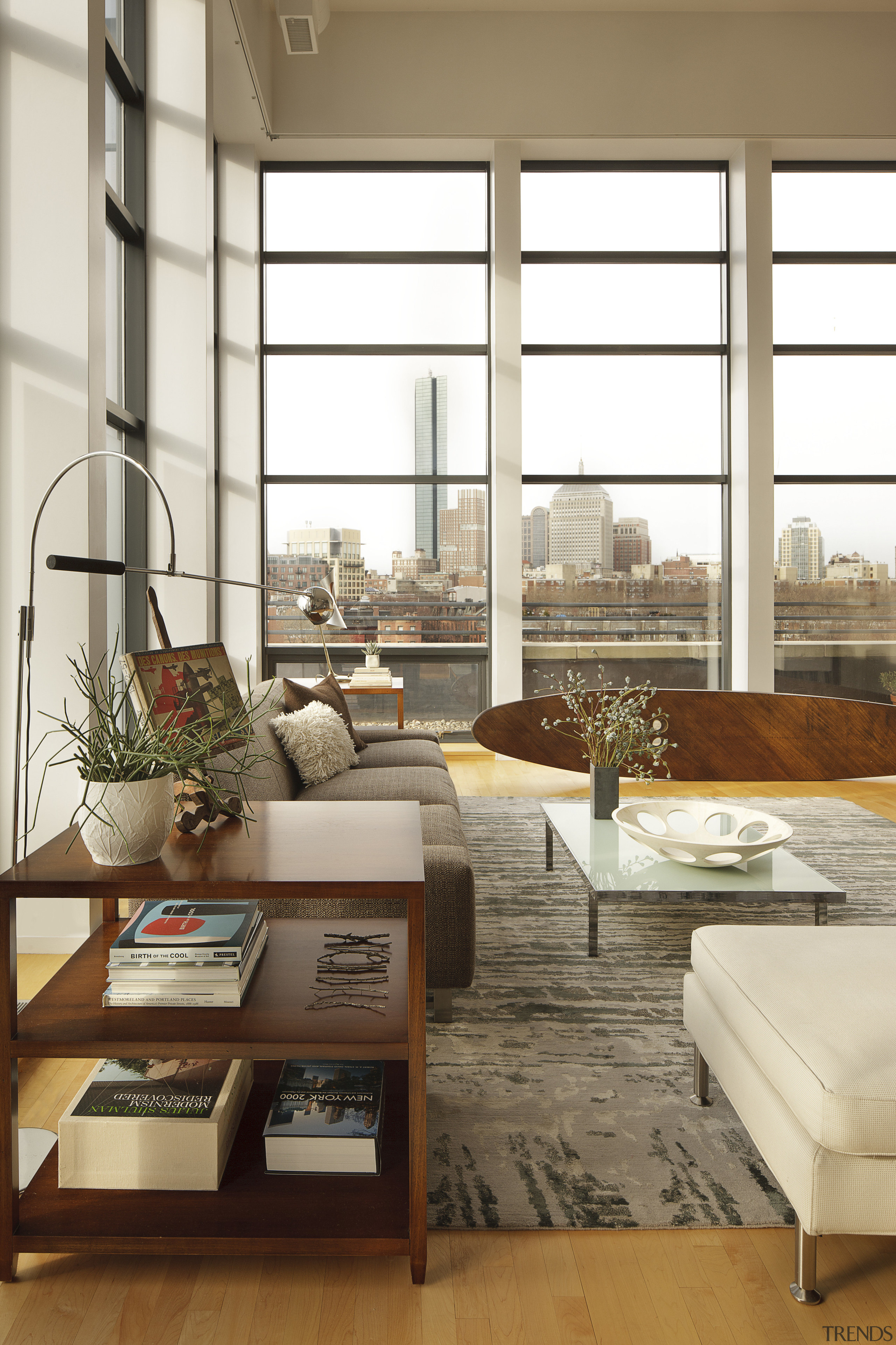 Furnishings were kept low-profile in this loft-style apartment home, interior design, living room, table, window, window covering, wood, white, brown