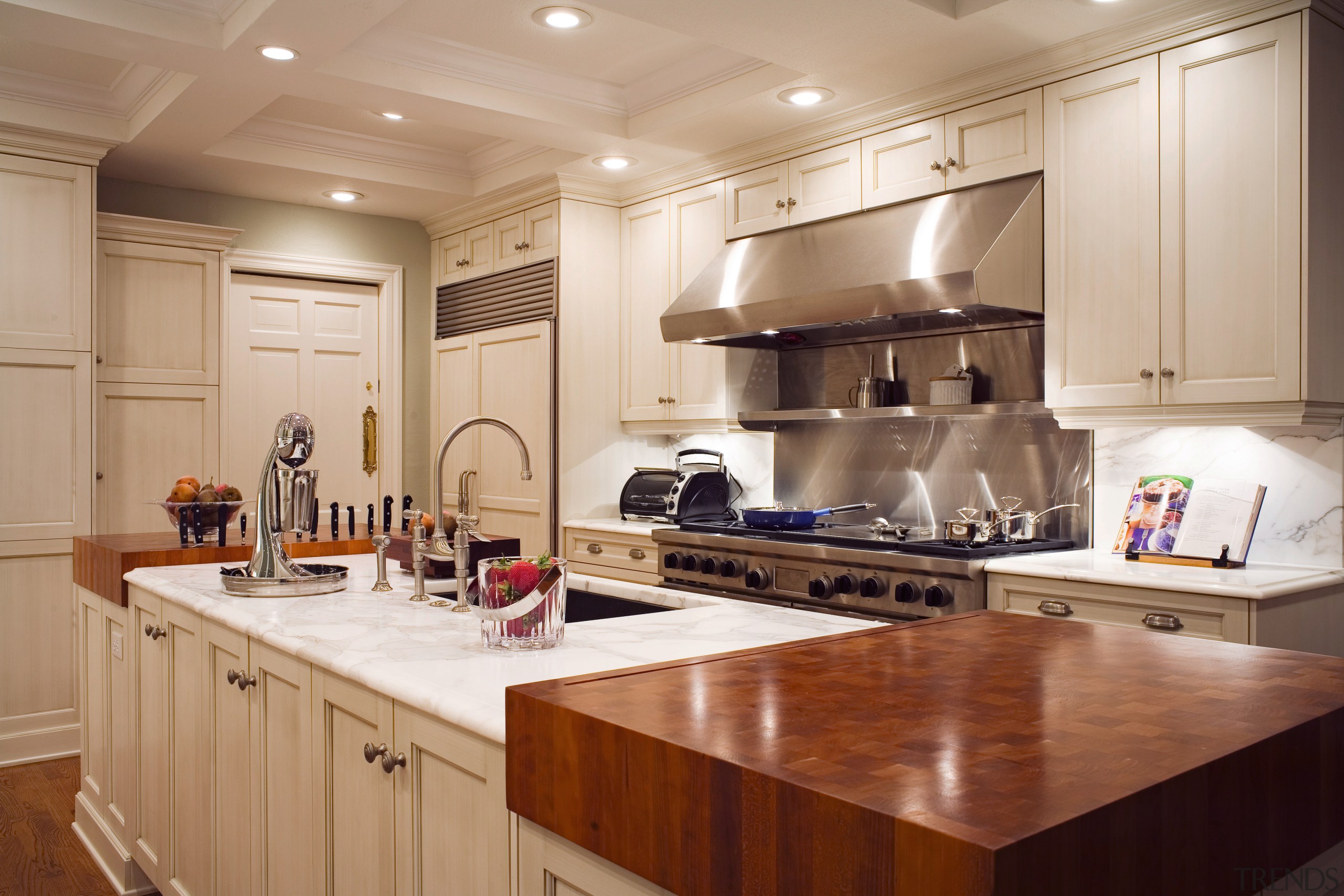 View of a kitchen which features cabinetry available cabinetry, countertop, cuisine classique, interior design, kitchen, room, brown, gray, orange