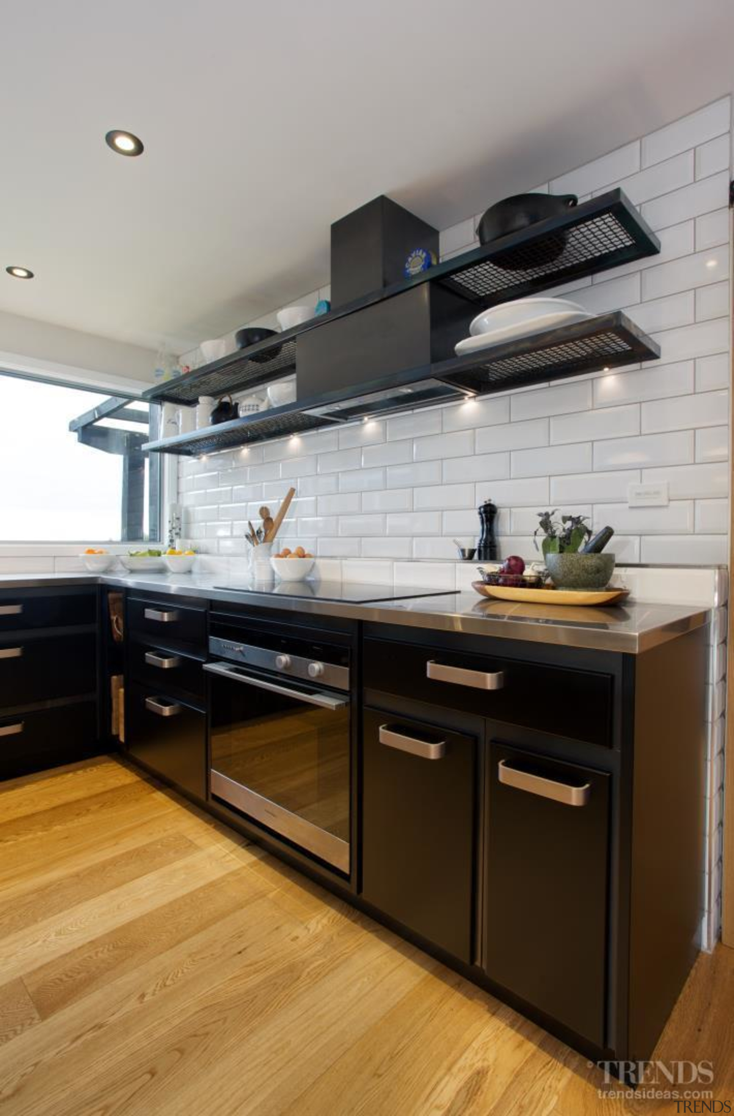 The powerpack above the cooktop in this renovated cabinetry, countertop, cuisine classique, floor, hardwood, interior design, kitchen, room, wood flooring, gray