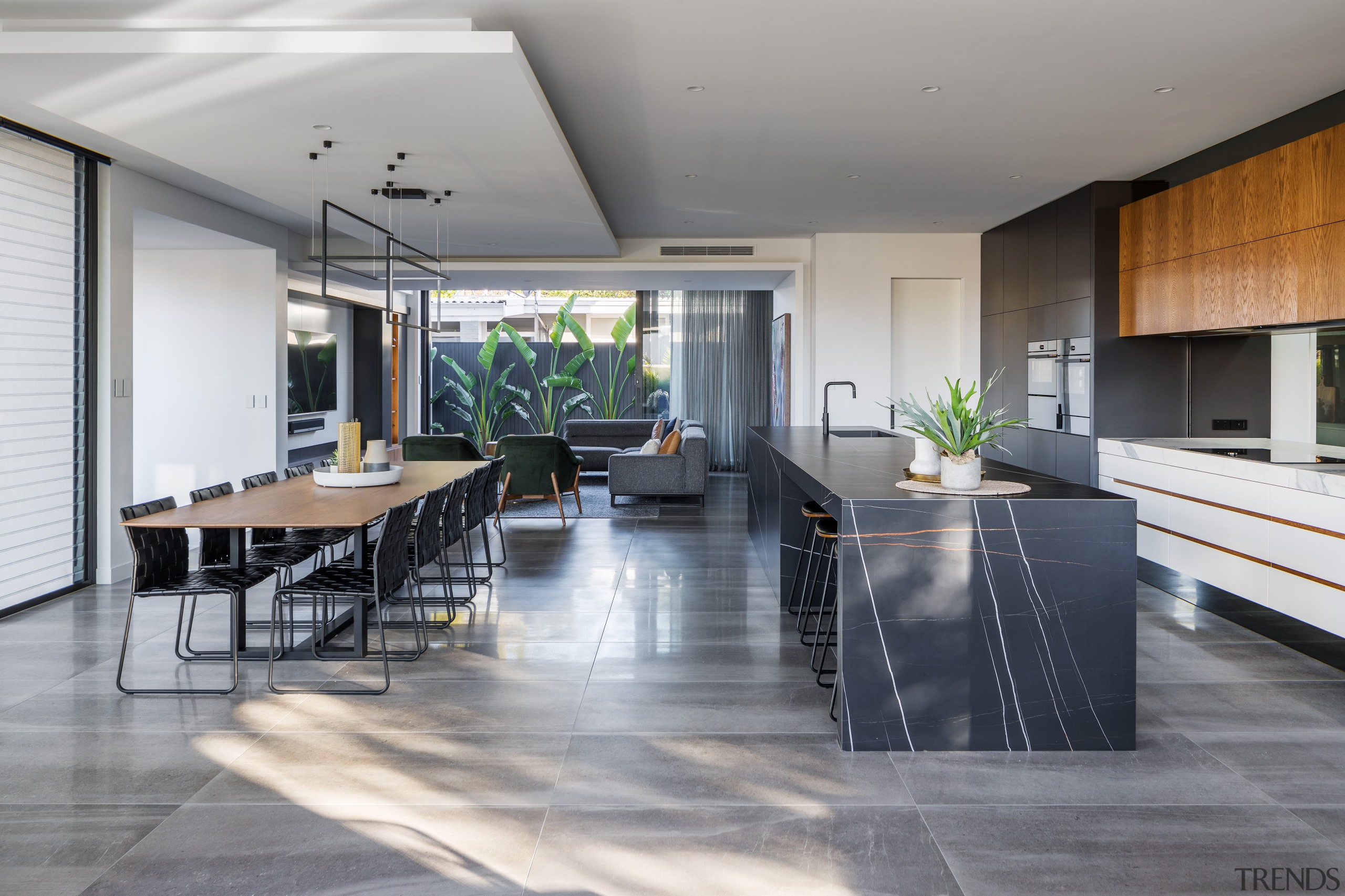 ​​​​​​​The casual island stools in this kitchen can 