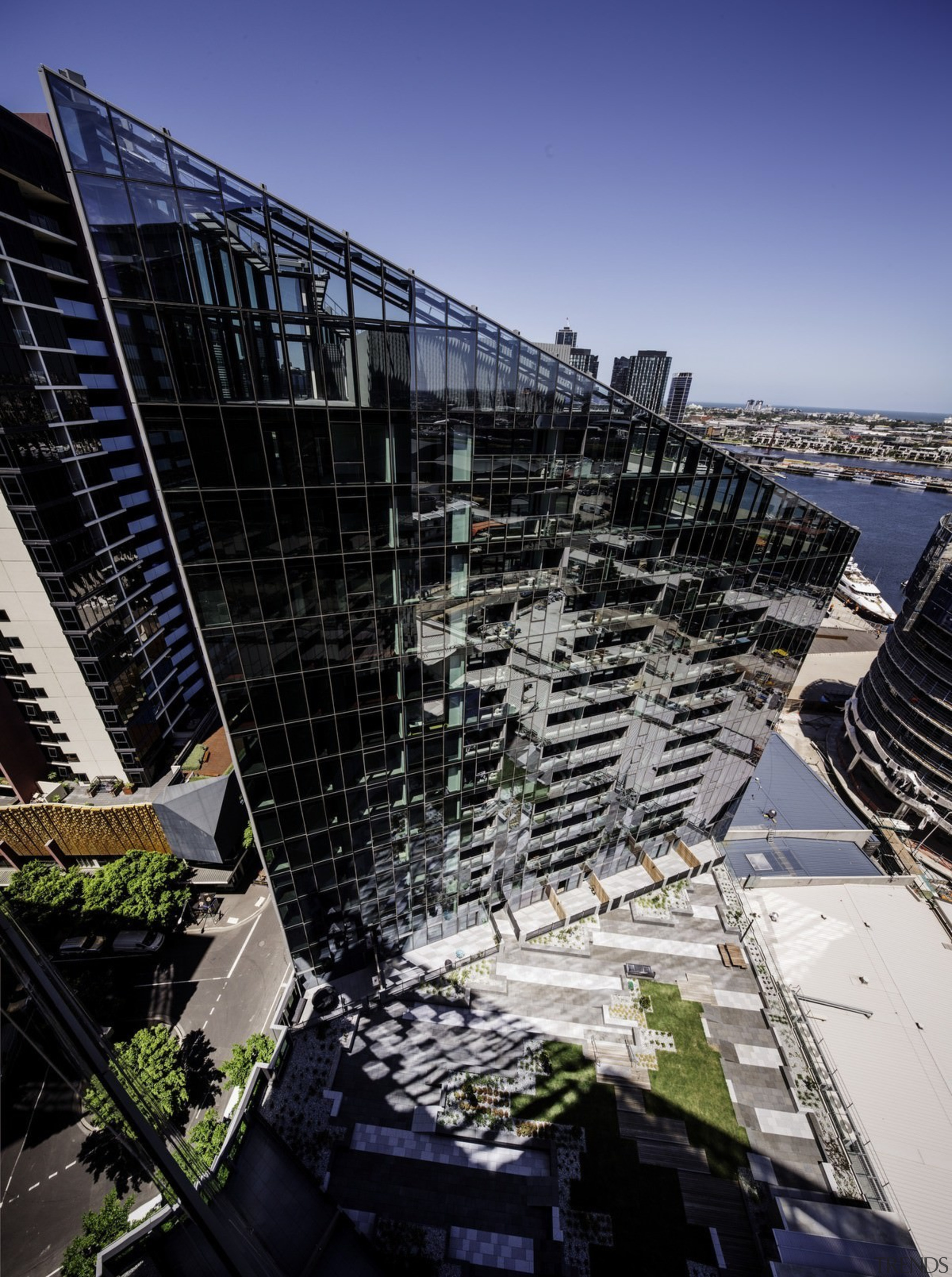 Promenade Aqui by Woods Bagot - Promenade Aqui architecture, building, city, cityscape, condominium, corporate headquarters, daytime, headquarters, landmark, metropolis, metropolitan area, mixed use, reflection, sky, skyscraper, structure, urban area, water, black