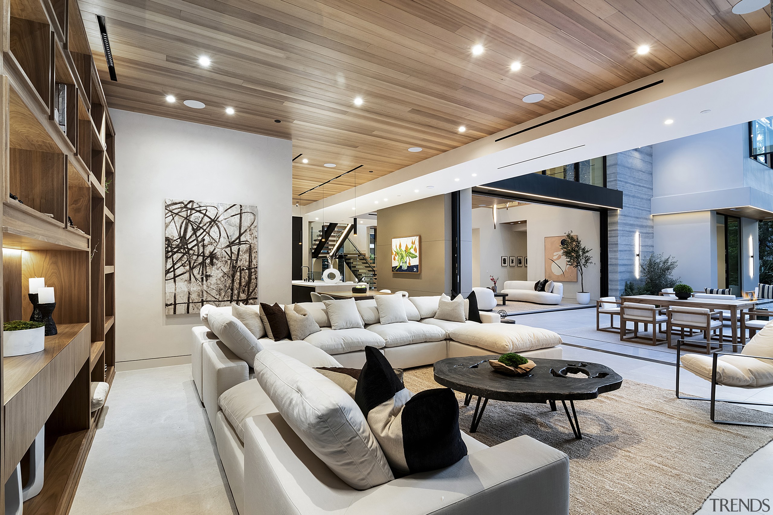 Living room with sculptural coffee table and showing 