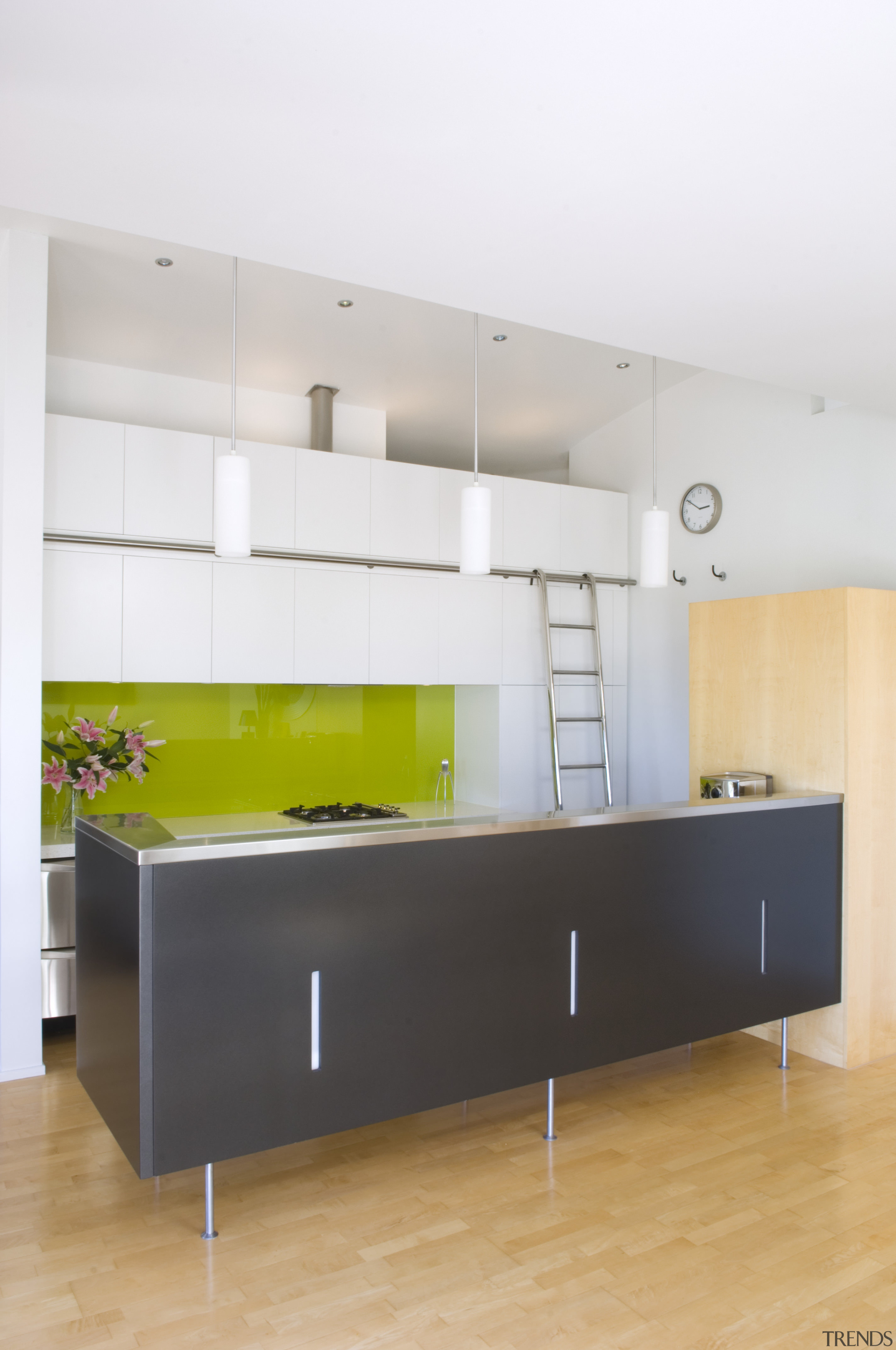 A view of the kitchen area, wooden flooring, architecture, cabinetry, countertop, floor, furniture, interior design, kitchen, product design, shelf, table, white