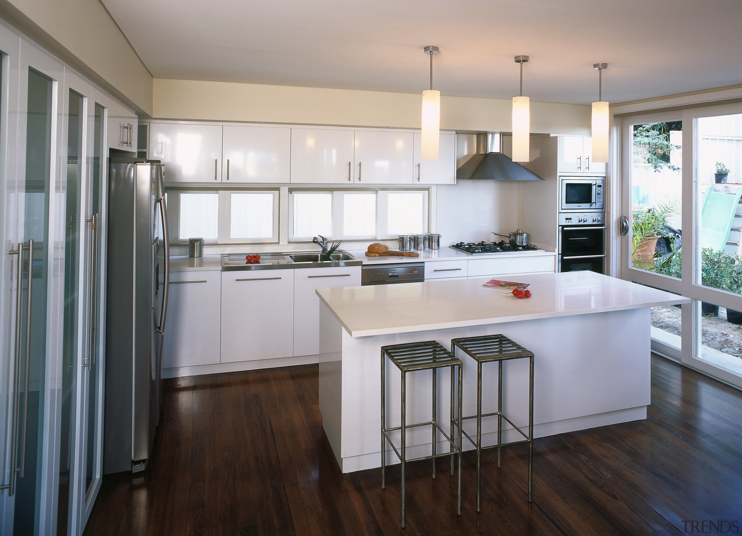 A view of a kitchen area, wooden flooring, cabinetry, countertop, cuisine classique, floor, flooring, hardwood, interior design, kitchen, real estate, room, wood flooring, gray