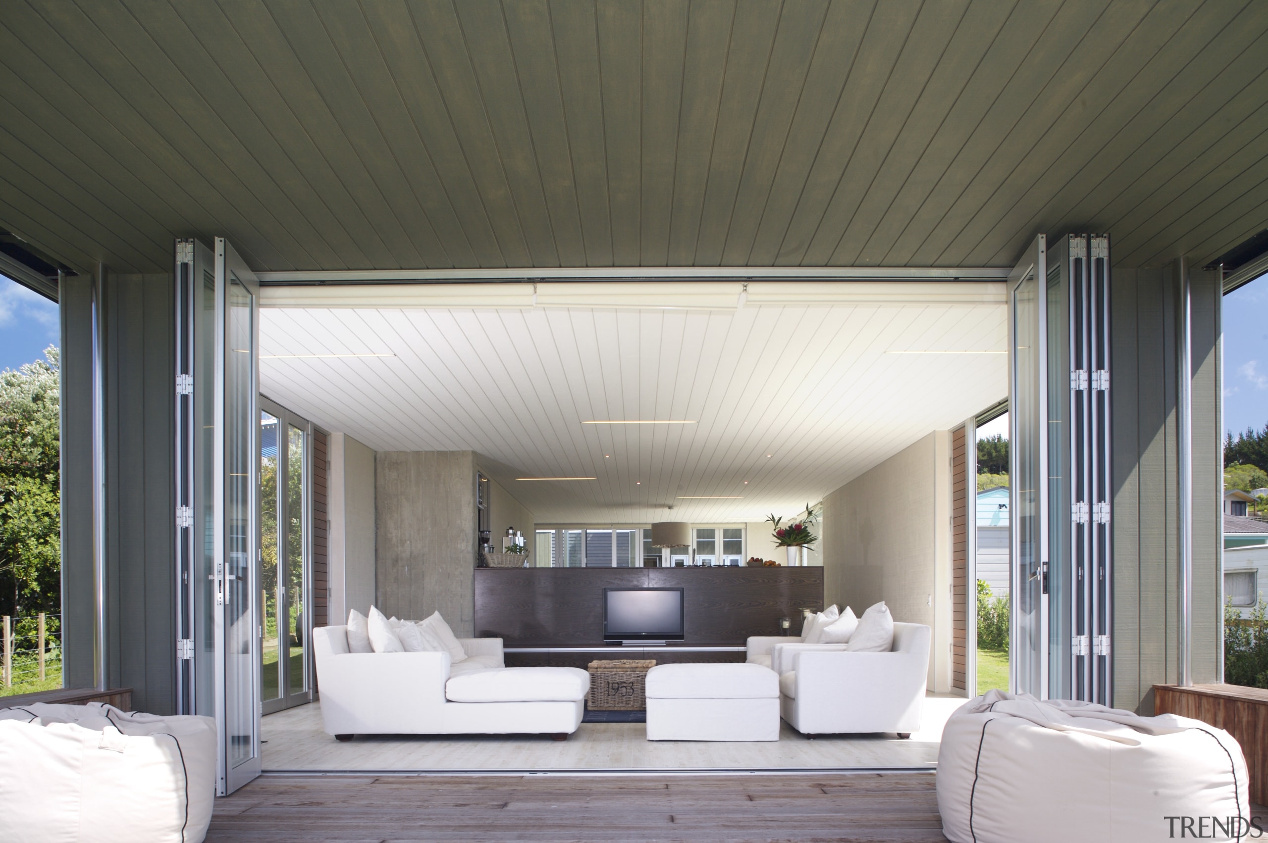 view of the living area with couches, telvision, architecture, ceiling, daylighting, home, house, interior design, living room, real estate, window, gray, white