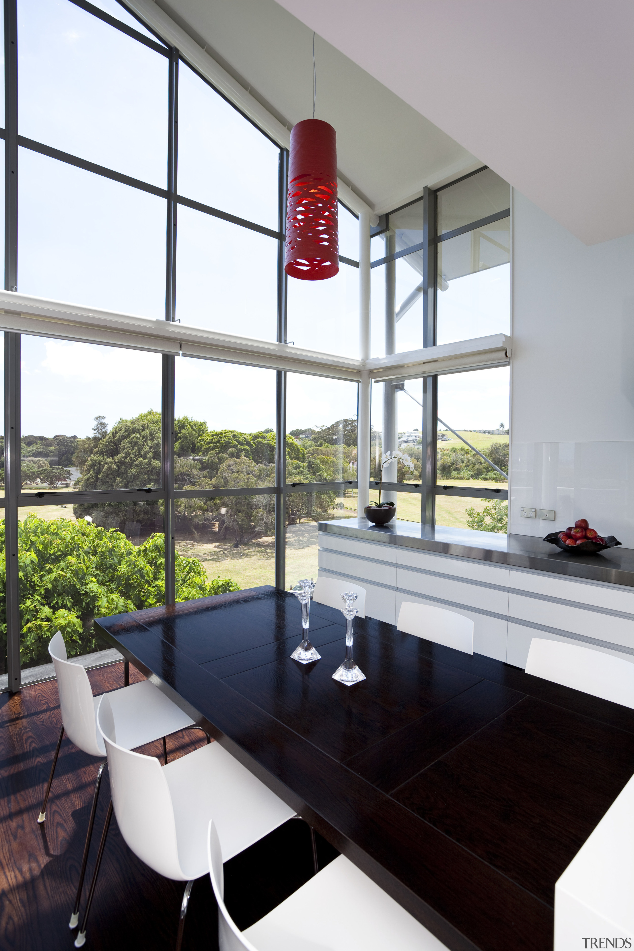 The dark timber floor, stainless benches and white architecture, home, house, interior design, table, window, white