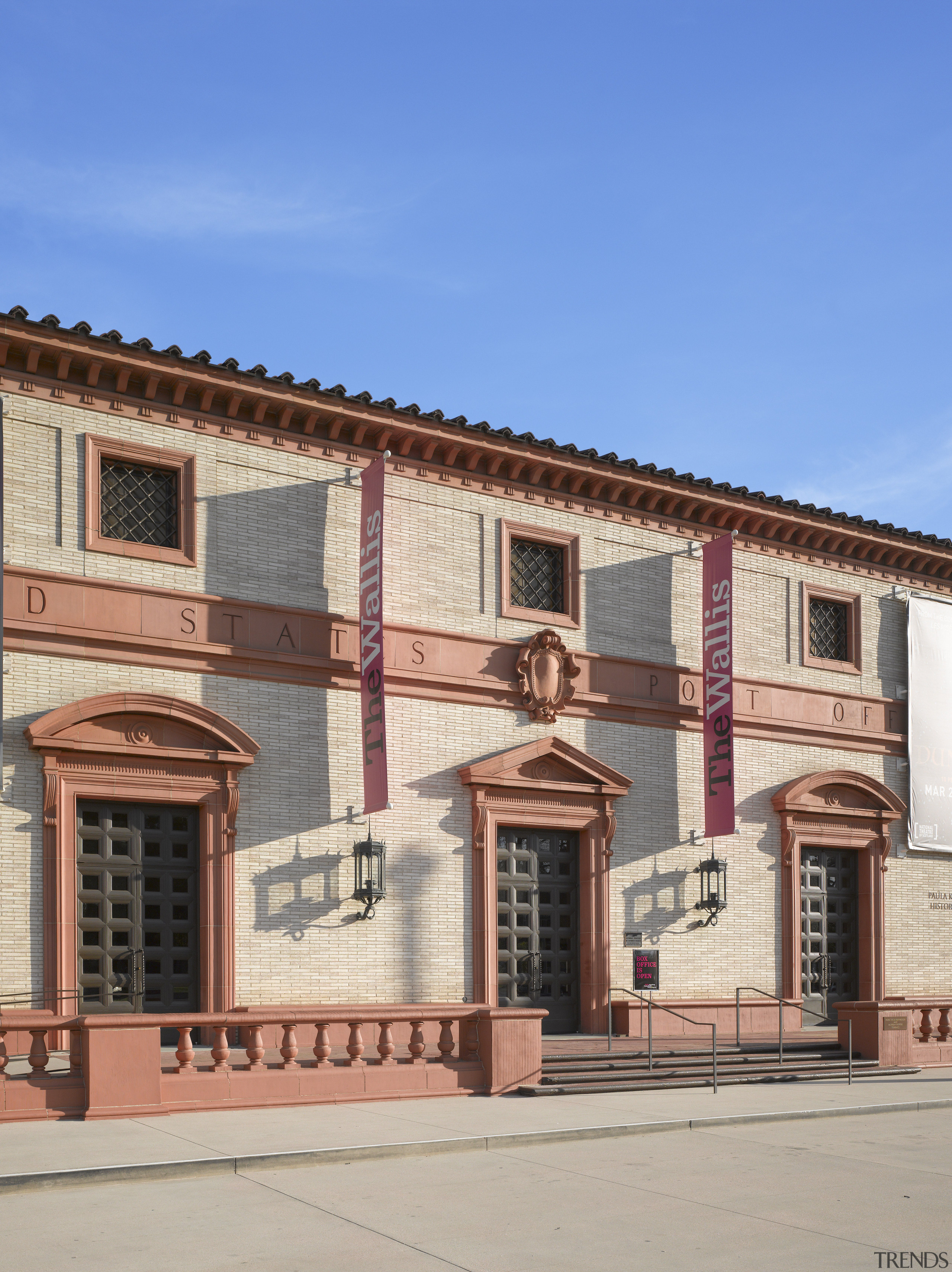 The old Beverly Hills post office is a architecture, brick, building, facade, home, house, landmark, neighbourhood, real estate, town, window, teal, gray