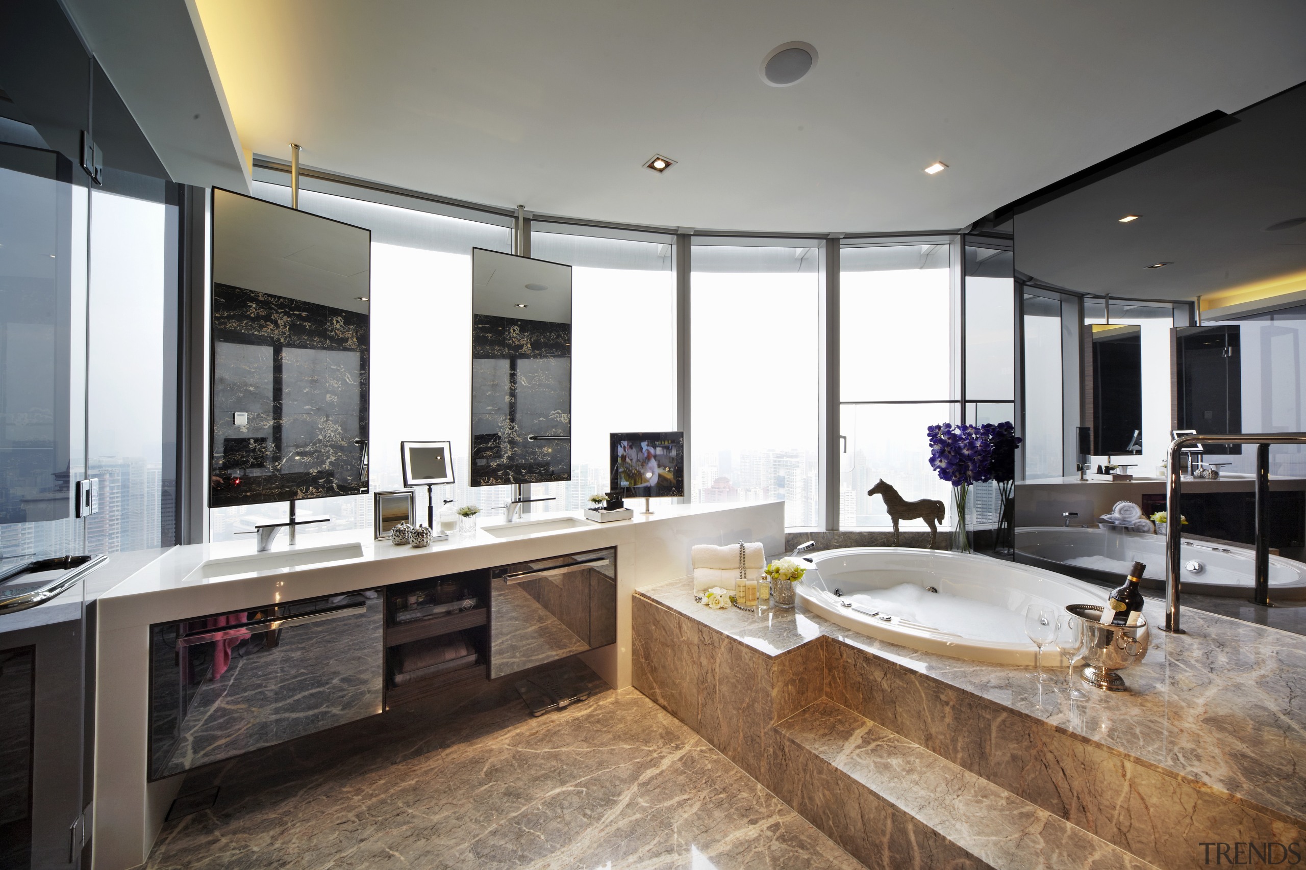 View of the bathroom.  The tiling is countertop, estate, interior design, kitchen, real estate, room, gray